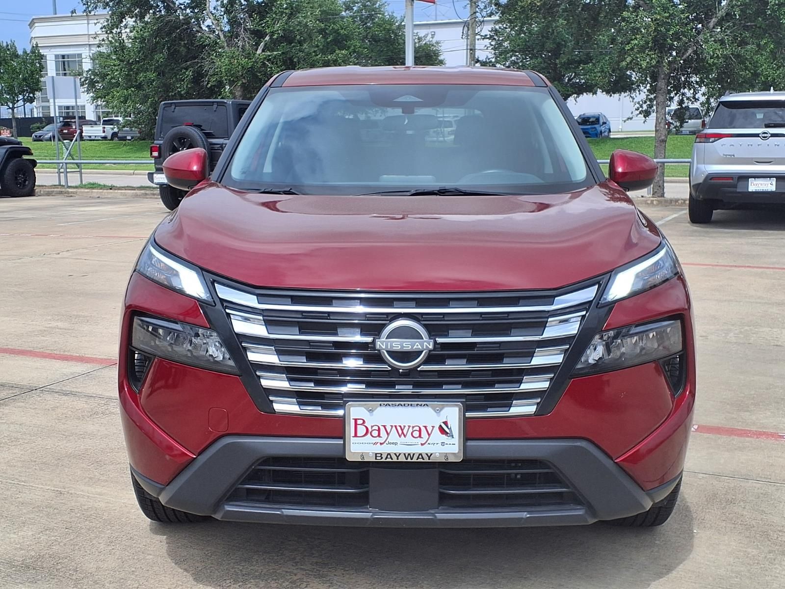 2025 Nissan Rogue SV Red at Central Houston Nissan