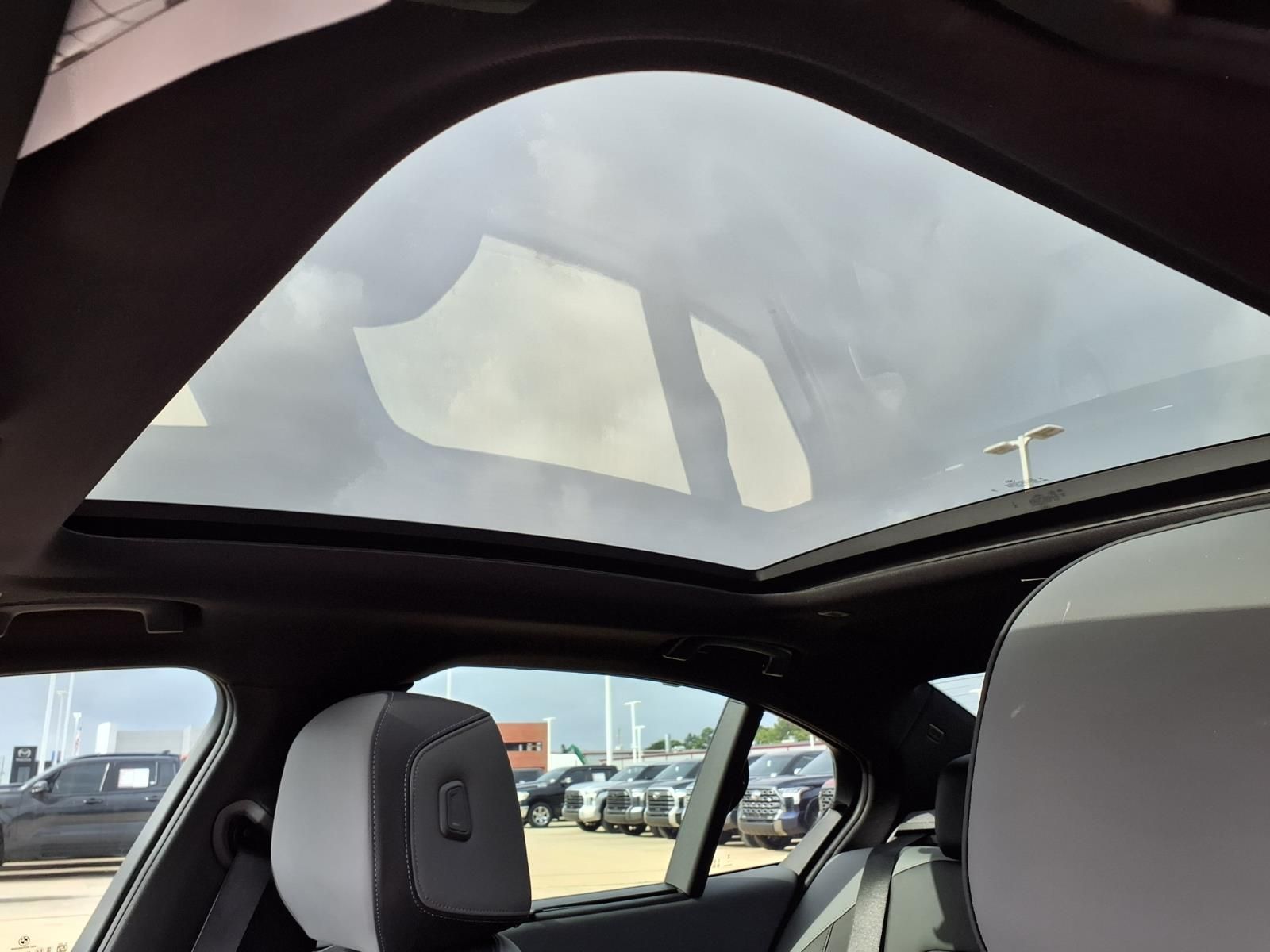 2026 BMW 5 Series 550e xDrive Black at Central Houston Nissan