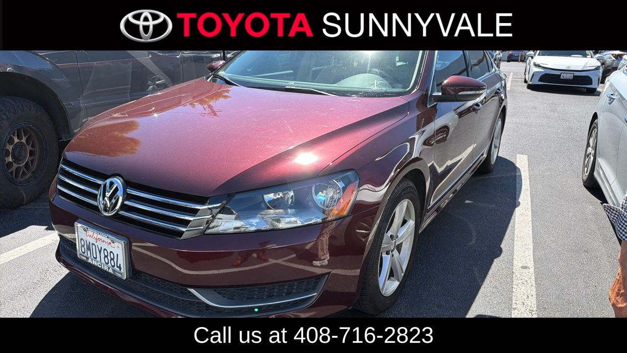 Opera Red Metallic 2012 Volkswagen Passat Sedan Front-Wheel Drive 6-Speed Automatic