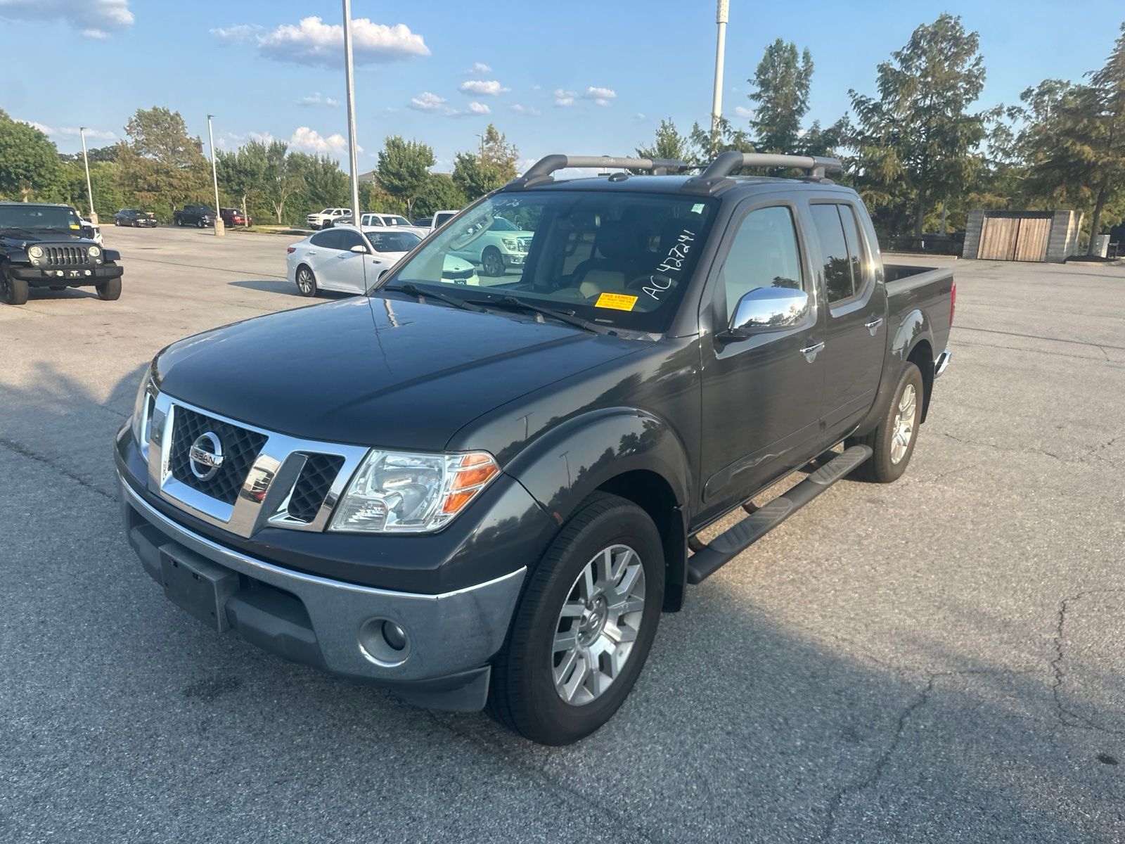 Gray 2010 Nissan Frontier Pickup Truck Four-Wheel Drive 5-Speed Automatic Overdrive