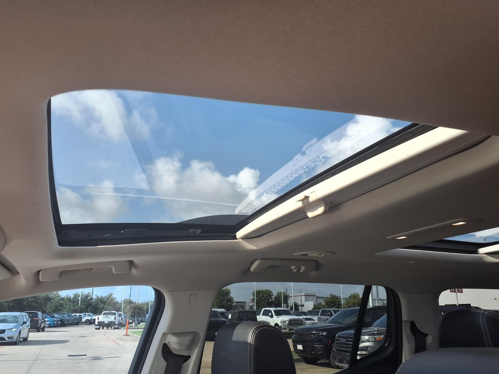 2022 GMC Acadia Denali Green at AutoSavvy Houston Southwest