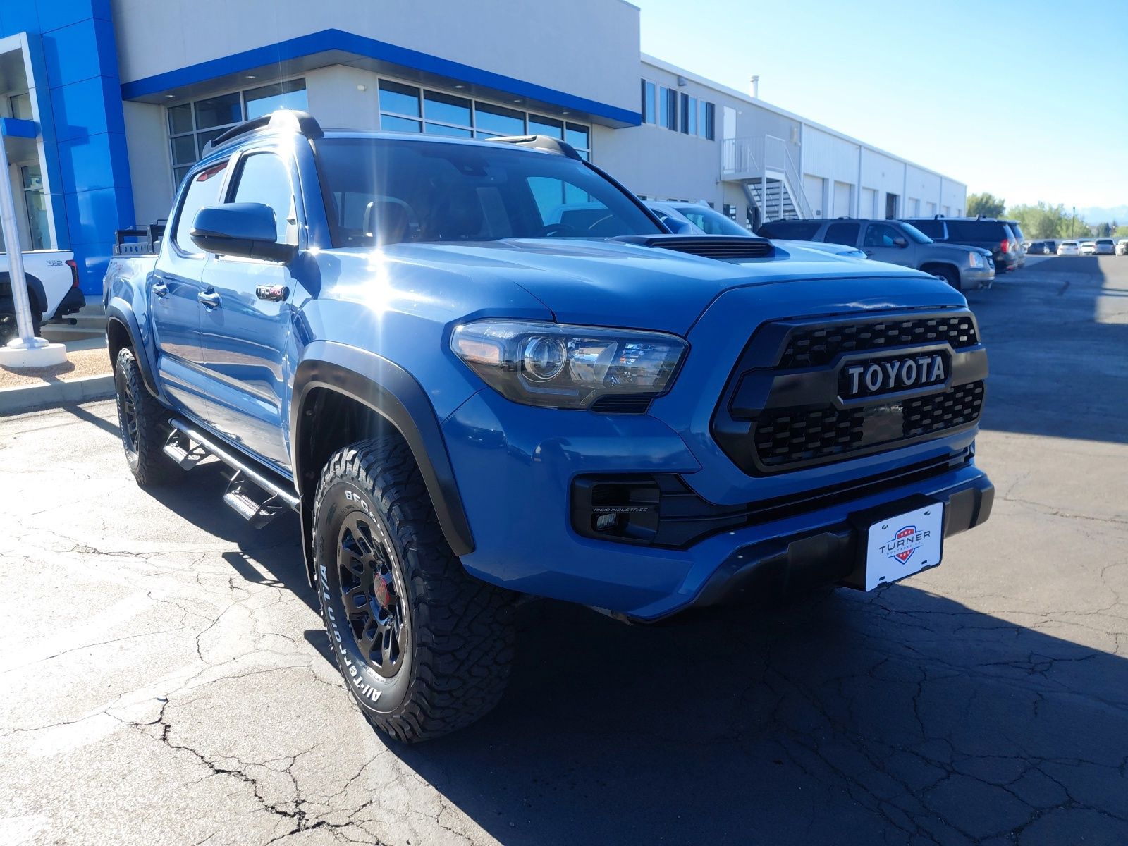 Blue 2018 Toyota Tacoma Pickup Truck Four-Wheel Drive 6-Speed Automatic