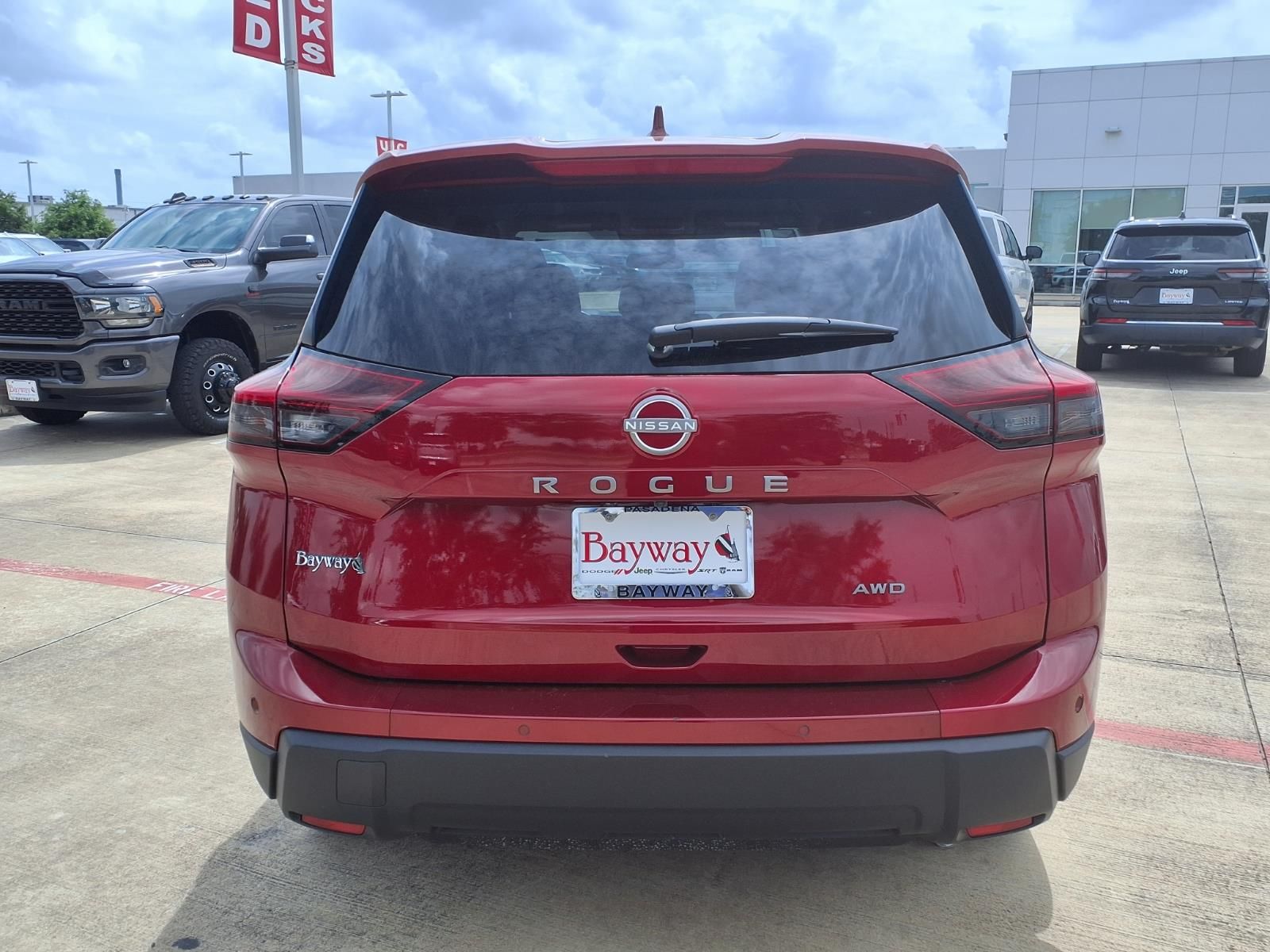 2025 Nissan Rogue SV Red at Central Houston Nissan