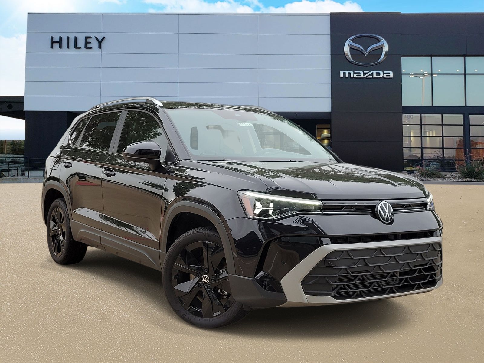 used 2025 Volkswagen Taos car, priced at $27,000