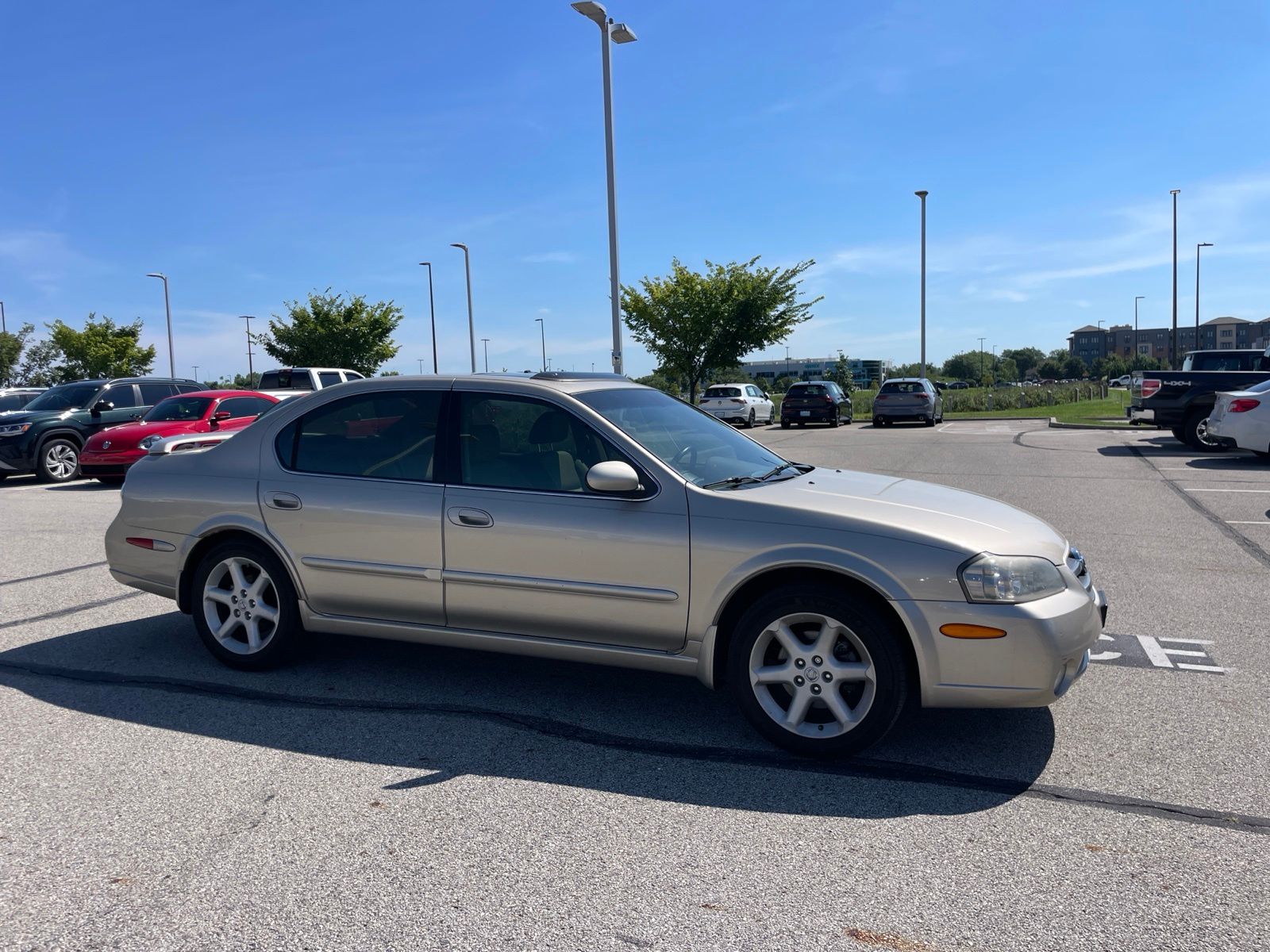 Sunlit Sand Metallic 2002 Nissan Maxima Sedan Front-Wheel Drive 6-Speed Manual