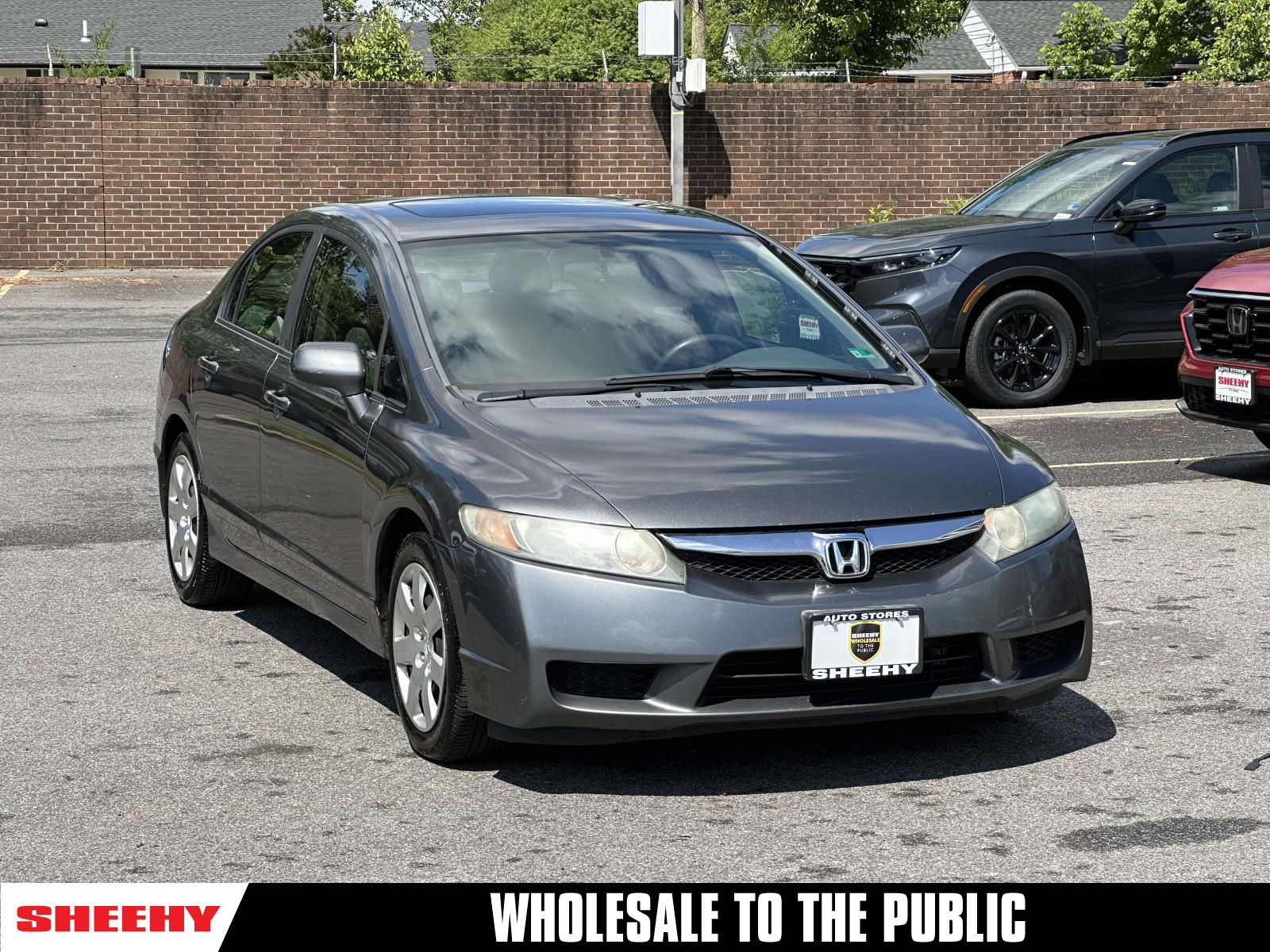 Polished Metal Metallic 2011 Honda Civic EX Sedan Front-Wheel Drive 5-Speed Automatic