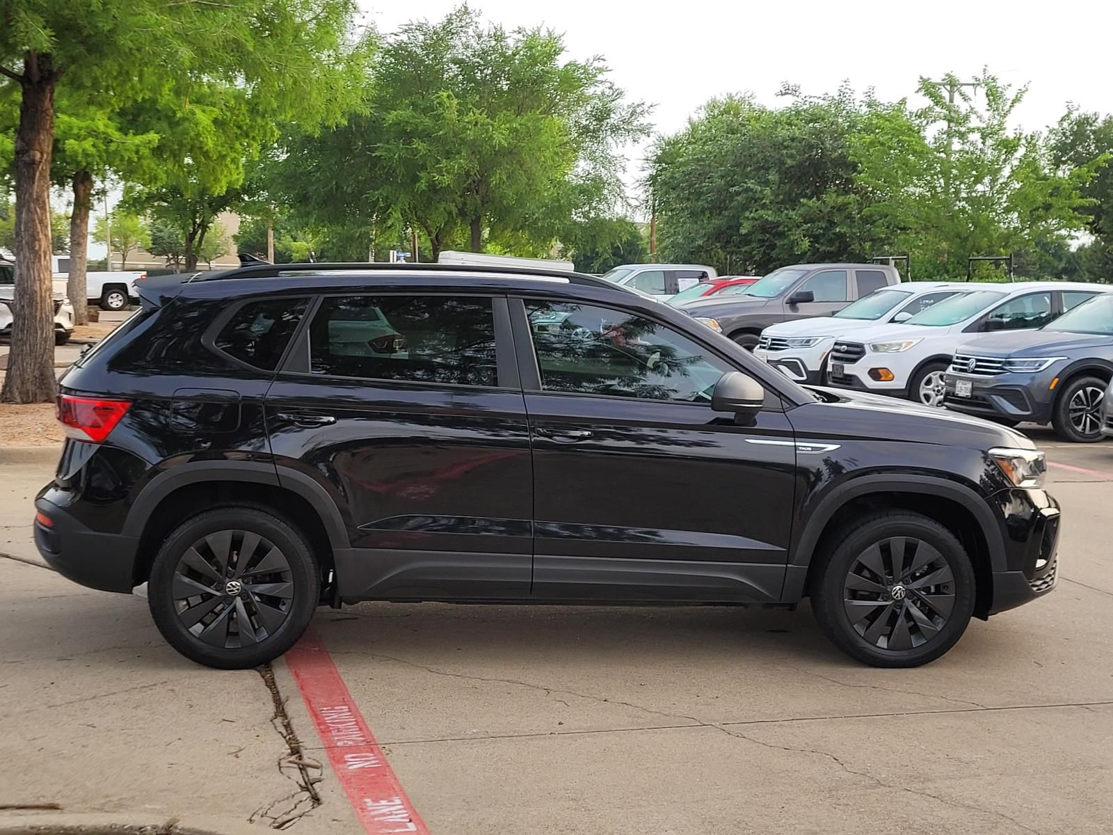 used 2023 Volkswagen Taos car, priced at $18,500