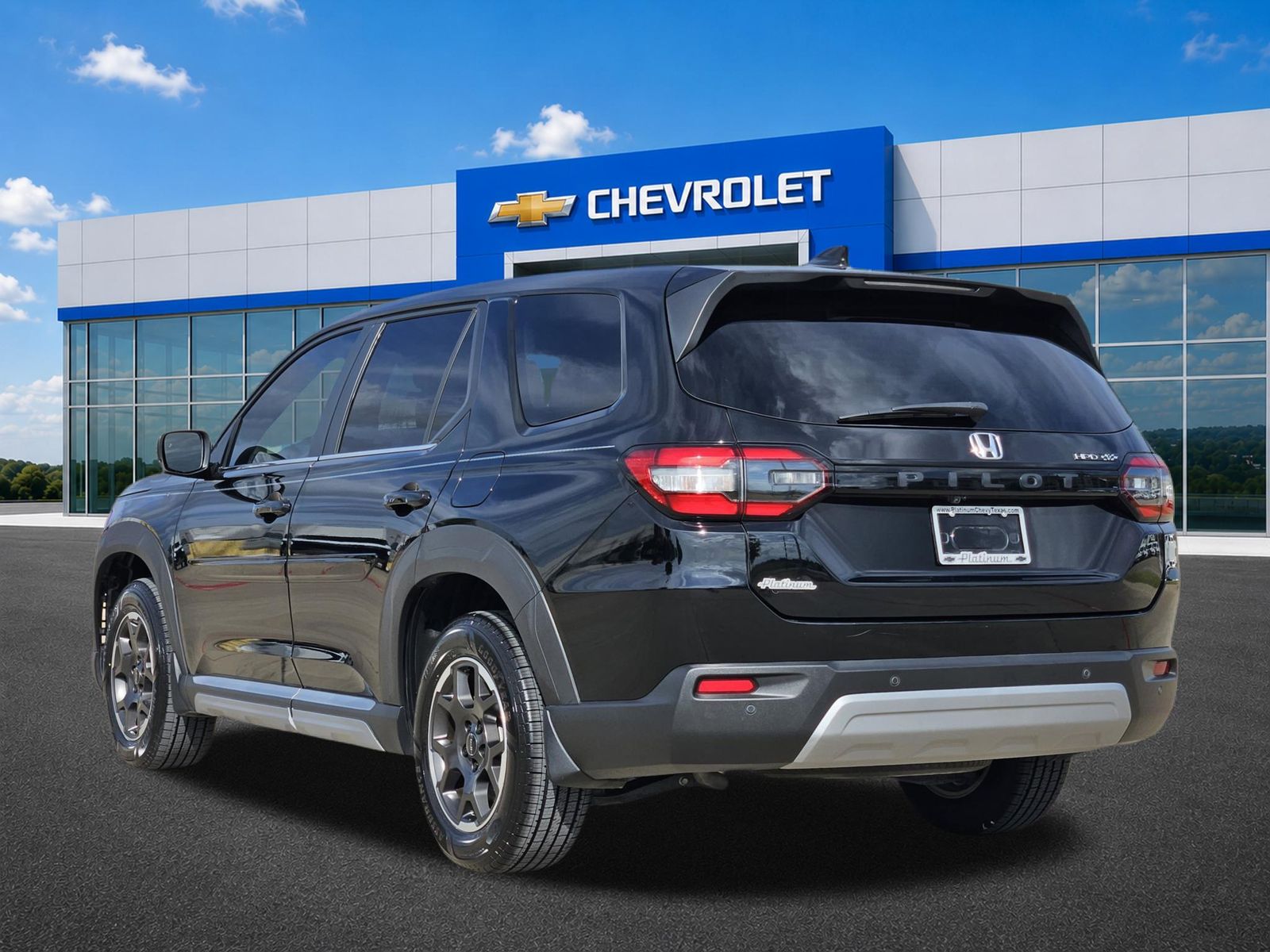 View vehicle photo 4
