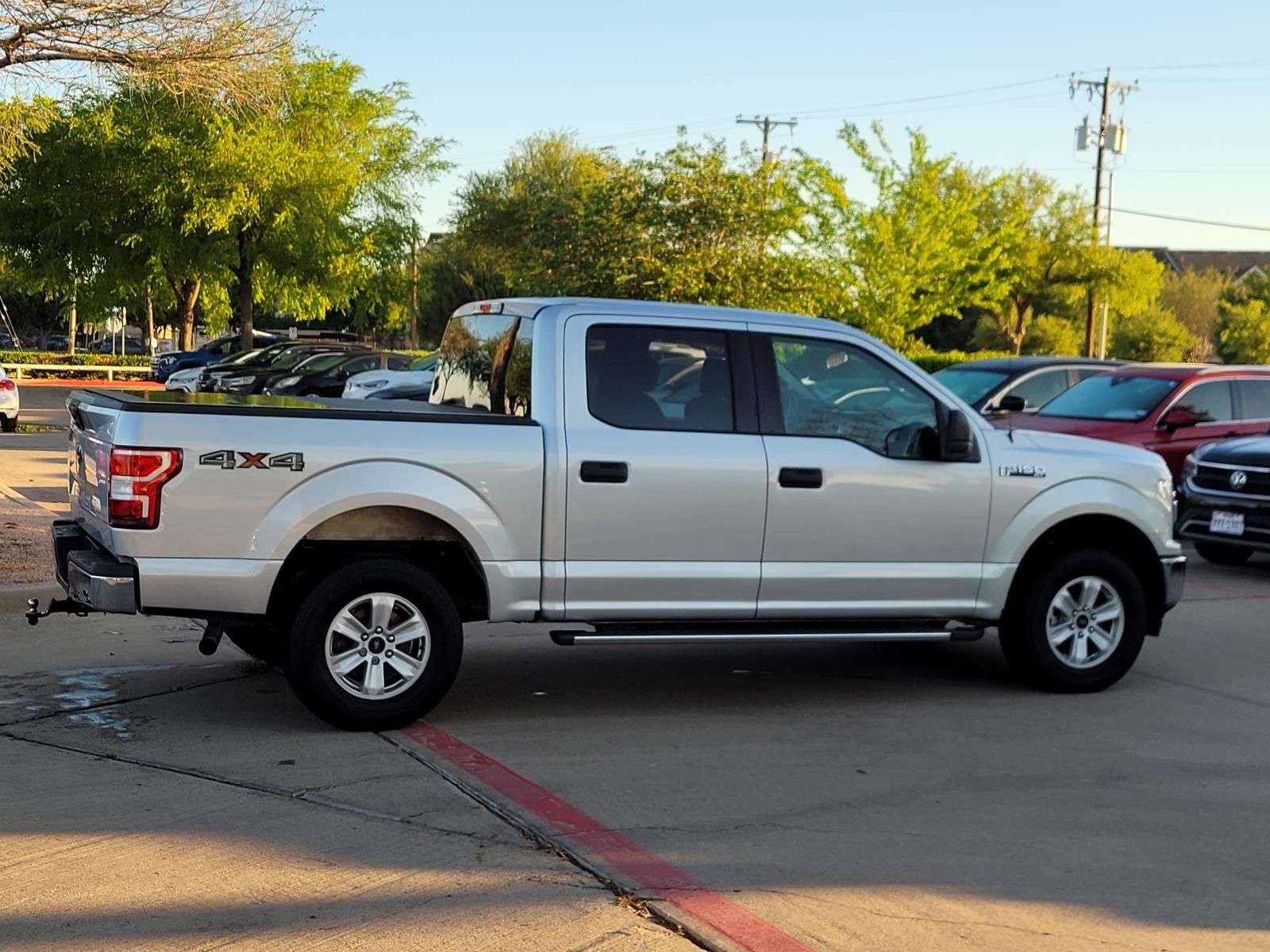 used 2018 Ford F-150 car, priced at $16,000