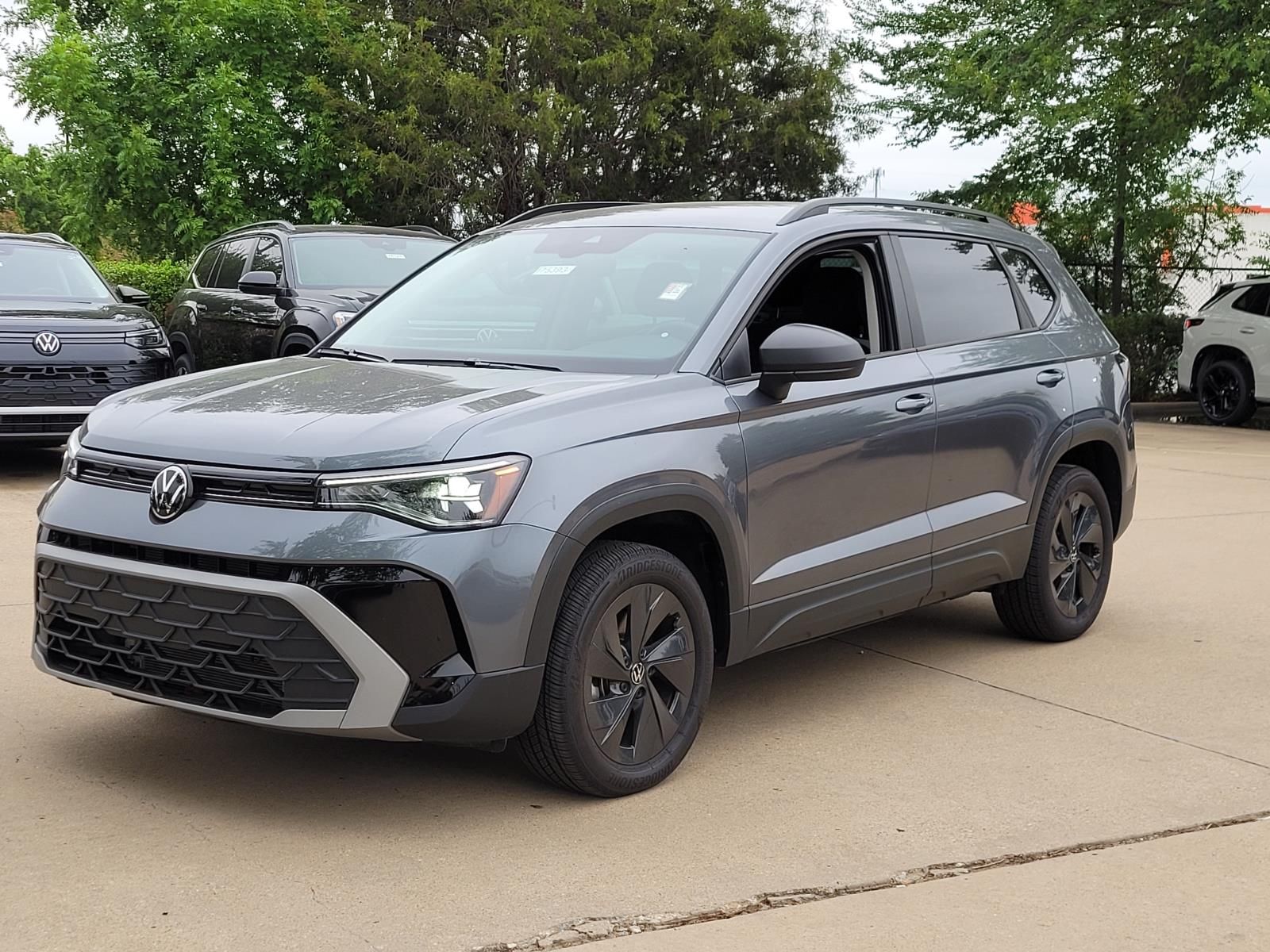 used 2025 Volkswagen Taos car, priced at $23,000