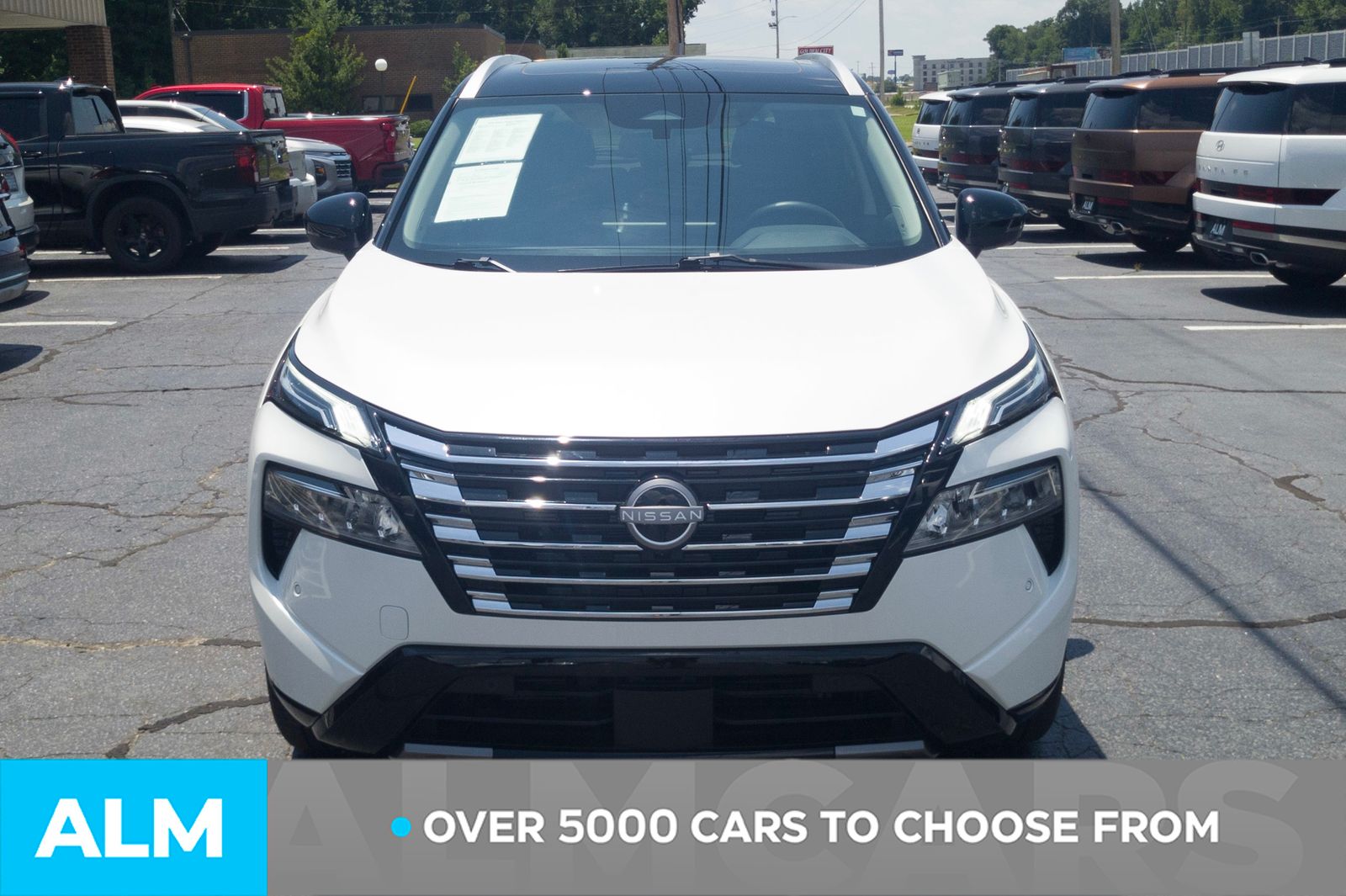 Used 2025 White Pearl Nissan Platinum image 2