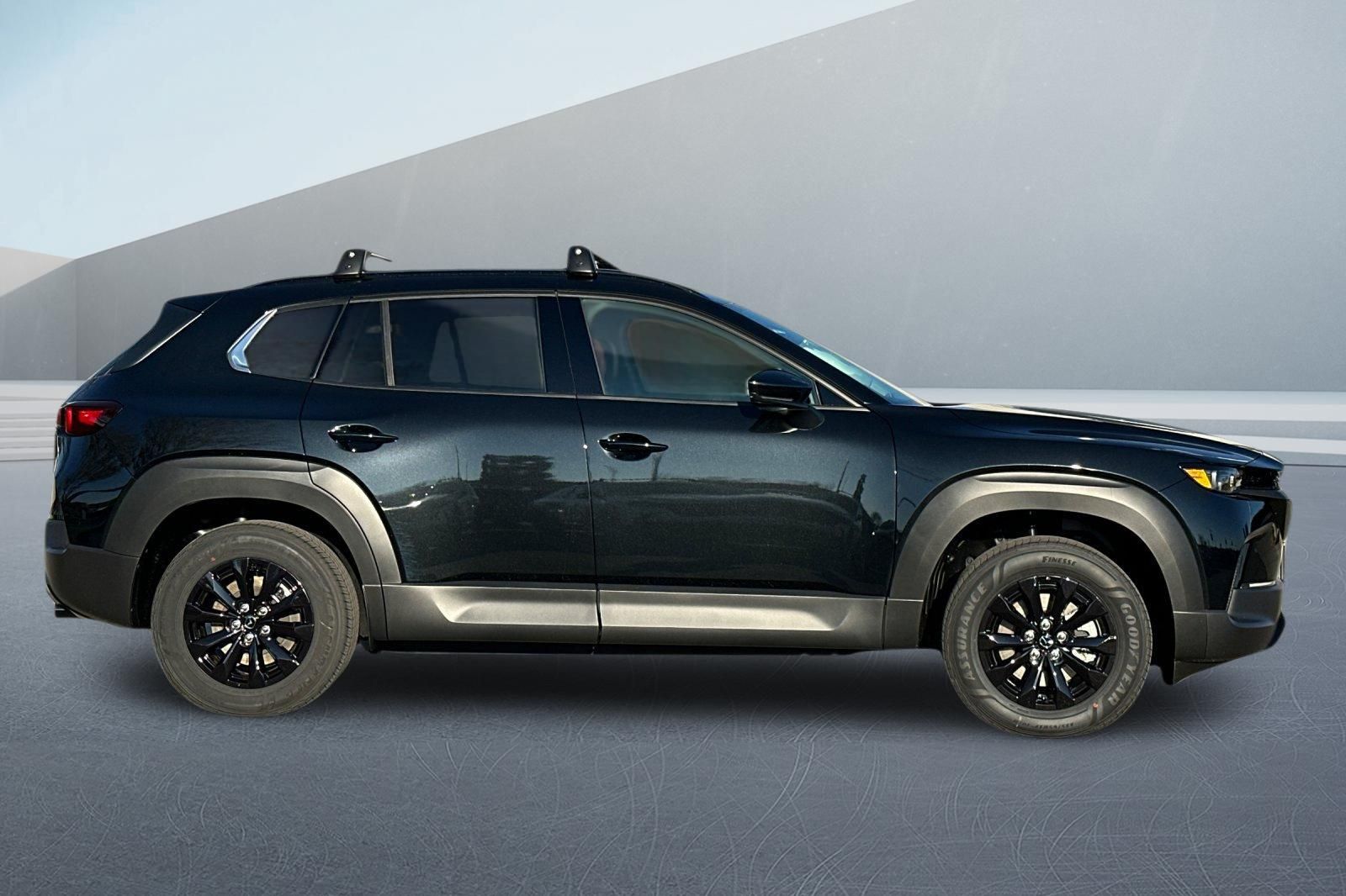 New 2026 Black Mazda Premium image 2