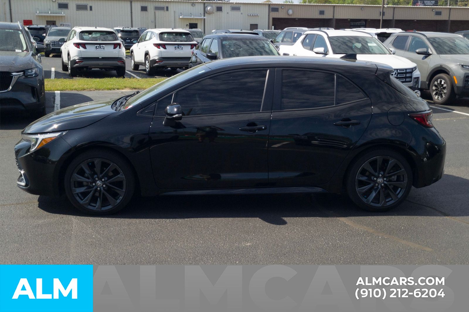 Used 2025 Midnight Black Metallic Toyota XSE image 11
