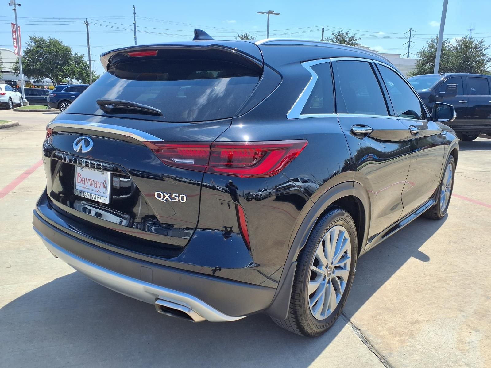 2023 INFINITI QX50 LUXE Black at South Houston Nissan
