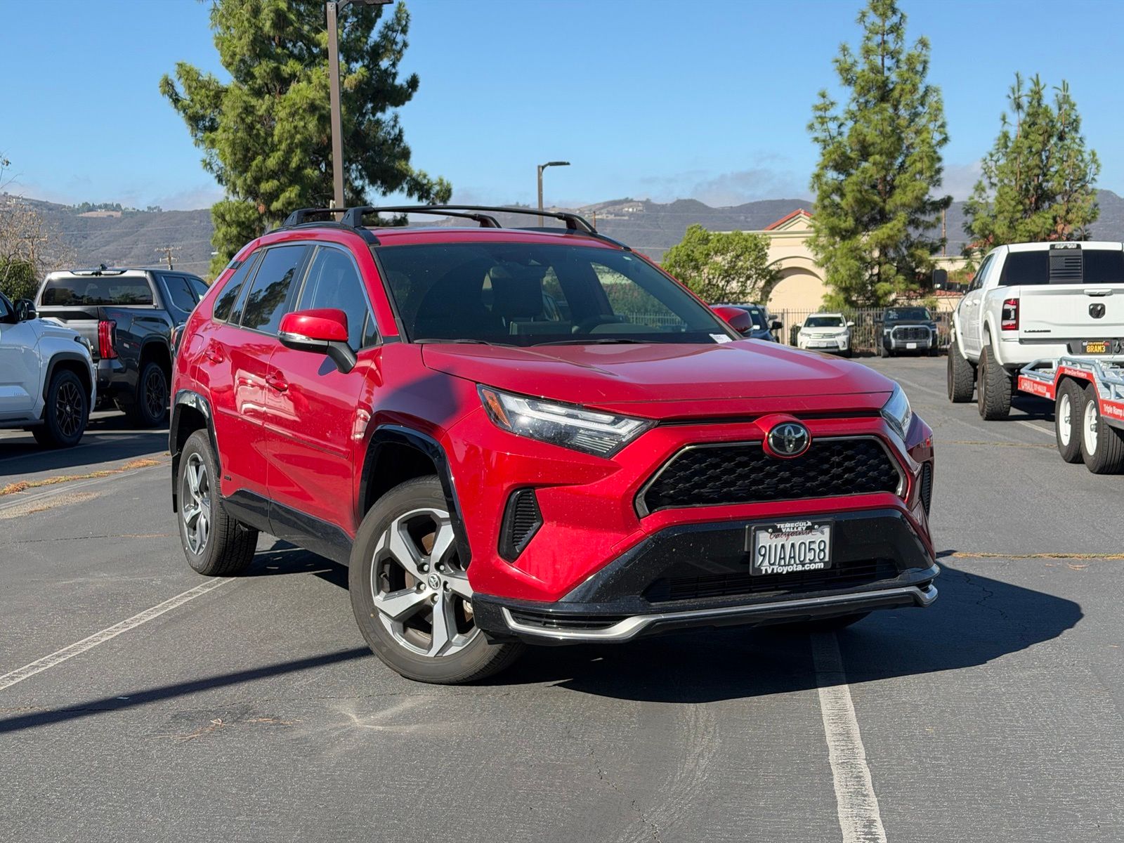 Supersonic Red 2025 Toyota RAV4 Plug-in Hybrid SUV / Crossover All-Wheel Drive Continuously Variable Transmission