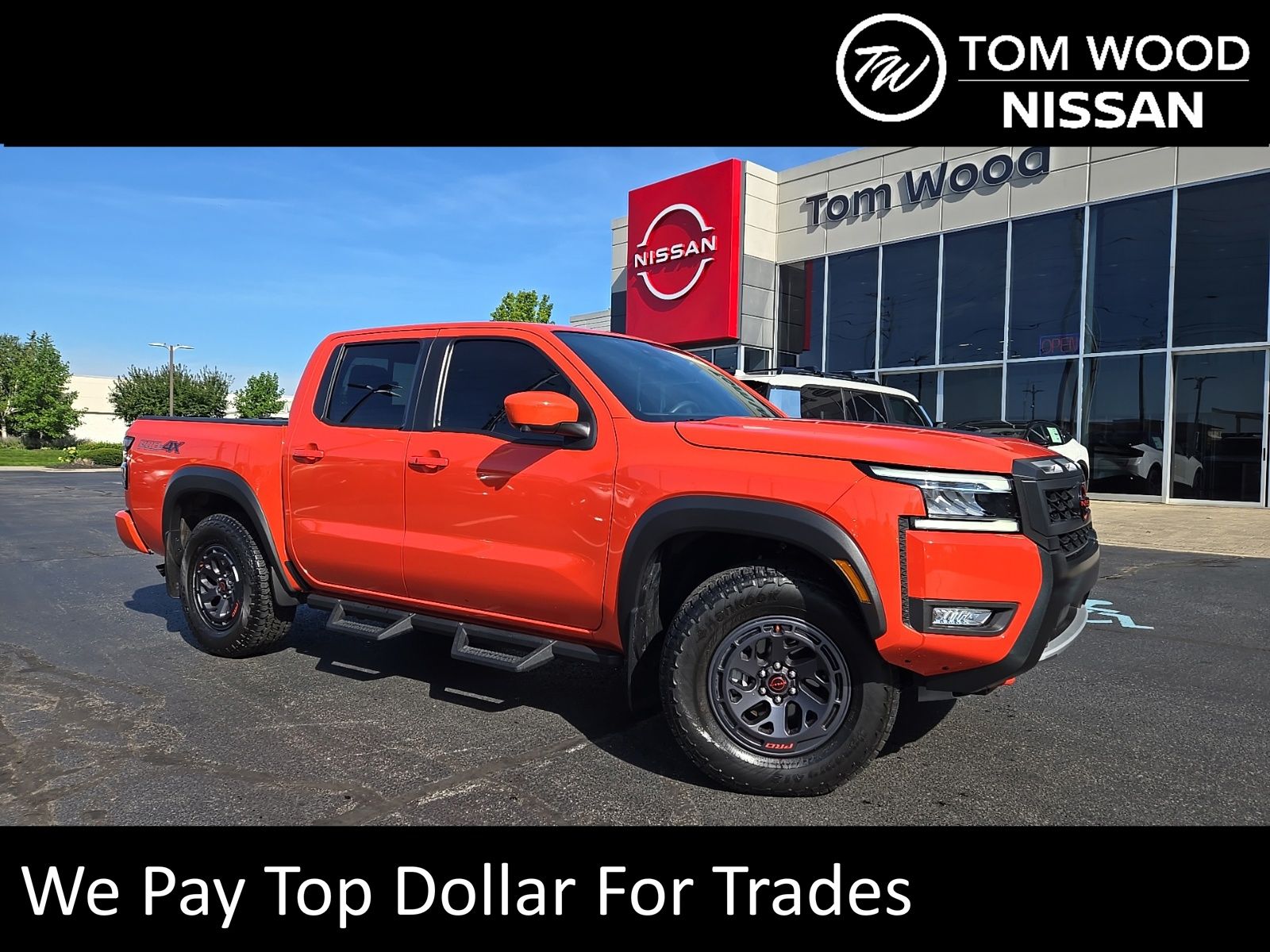 Afterburn Orange 2025 Nissan Frontier Pickup Truck Four-Wheel Drive 9-Speed Automatic Overdrive