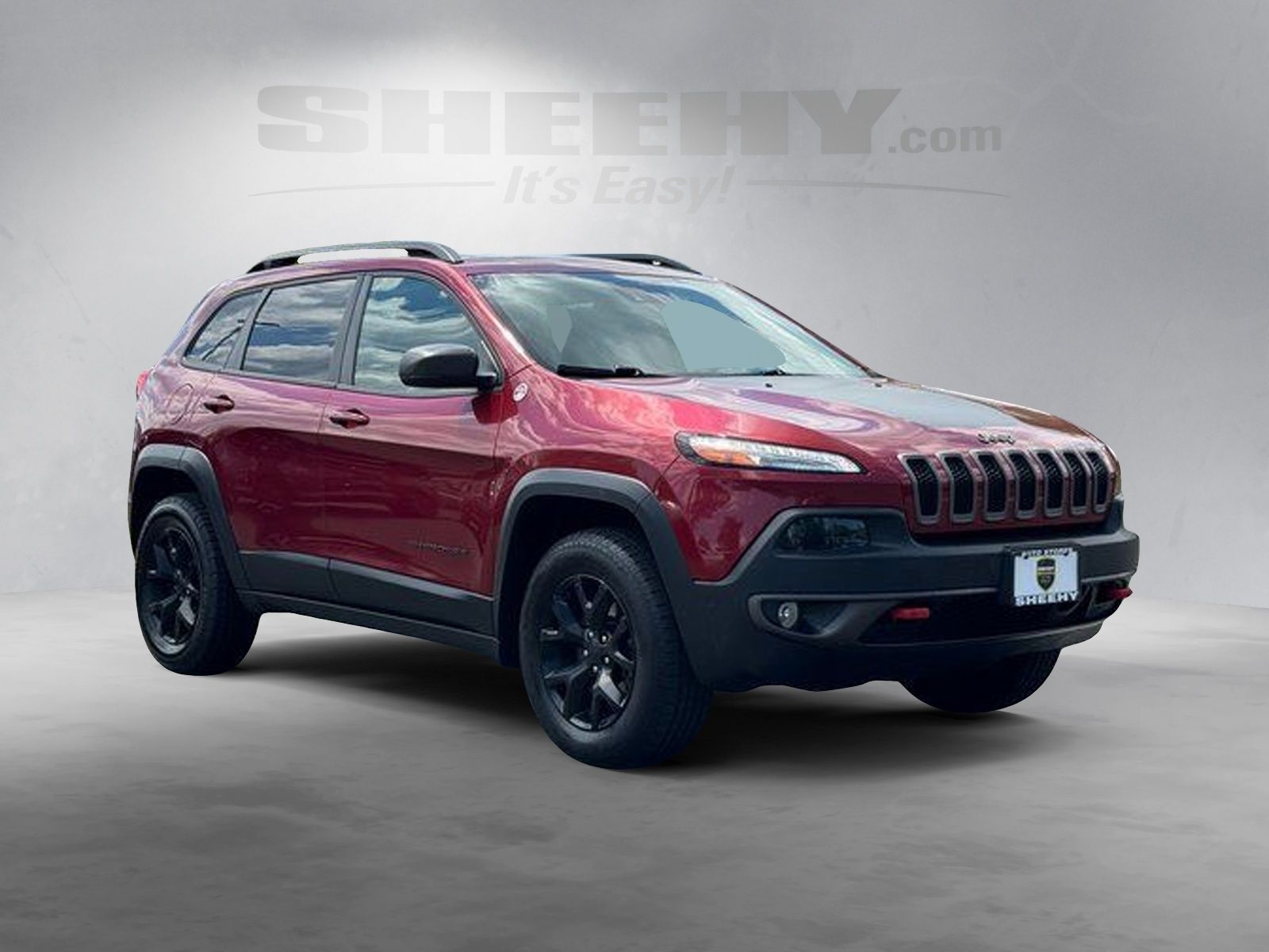 Used 2016 Red Jeep Trailhawk image 2