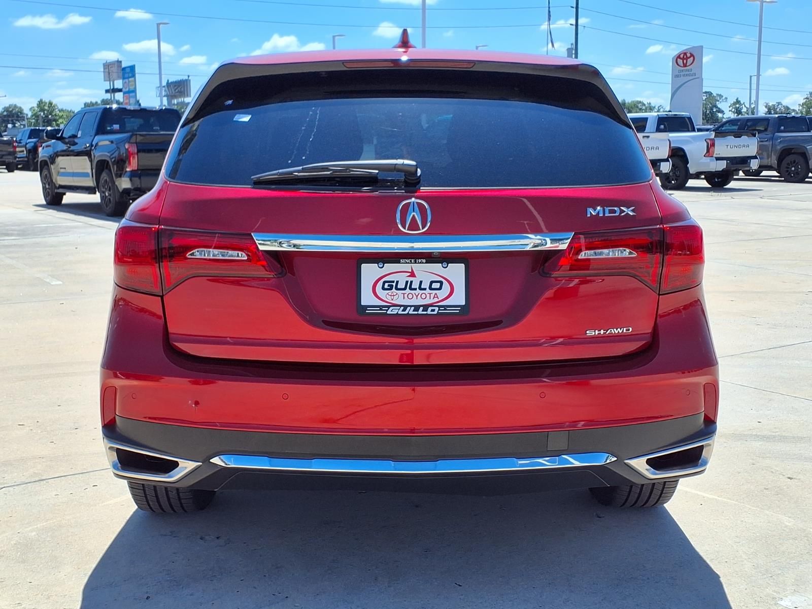 2020 Acura MDX Technology Red at Genesis of Spring