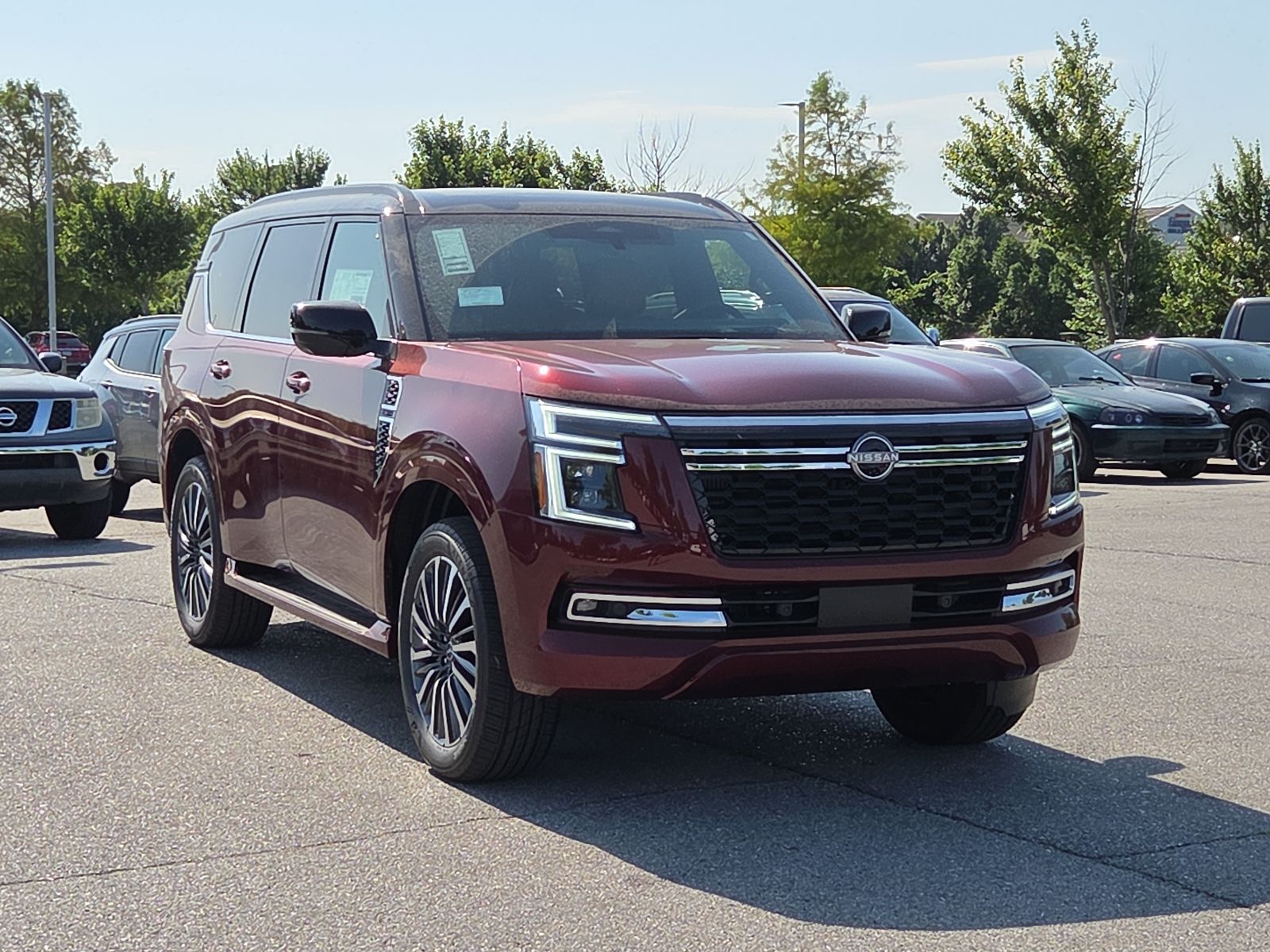 Coulis Red Pearl/Super Black 2026 Nissan Armada SUV / Crossover Four-Wheel Drive 9-Speed Automatic