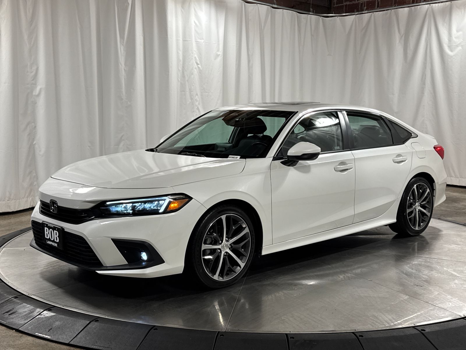 Platinum White Pearl 2023 Honda Civic Touring FWD Sedan Front-Wheel Drive Continuously Variable Transmission