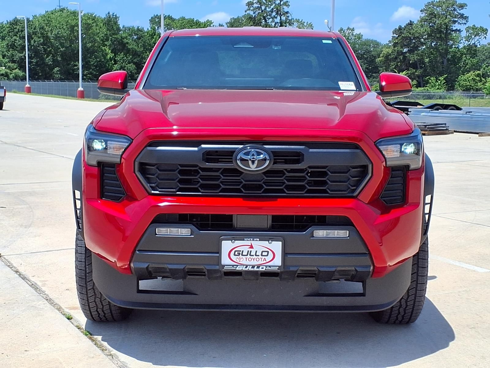 2025 Toyota Tacoma Hybrid TRD Off Road Red at EAG Ford Navasota