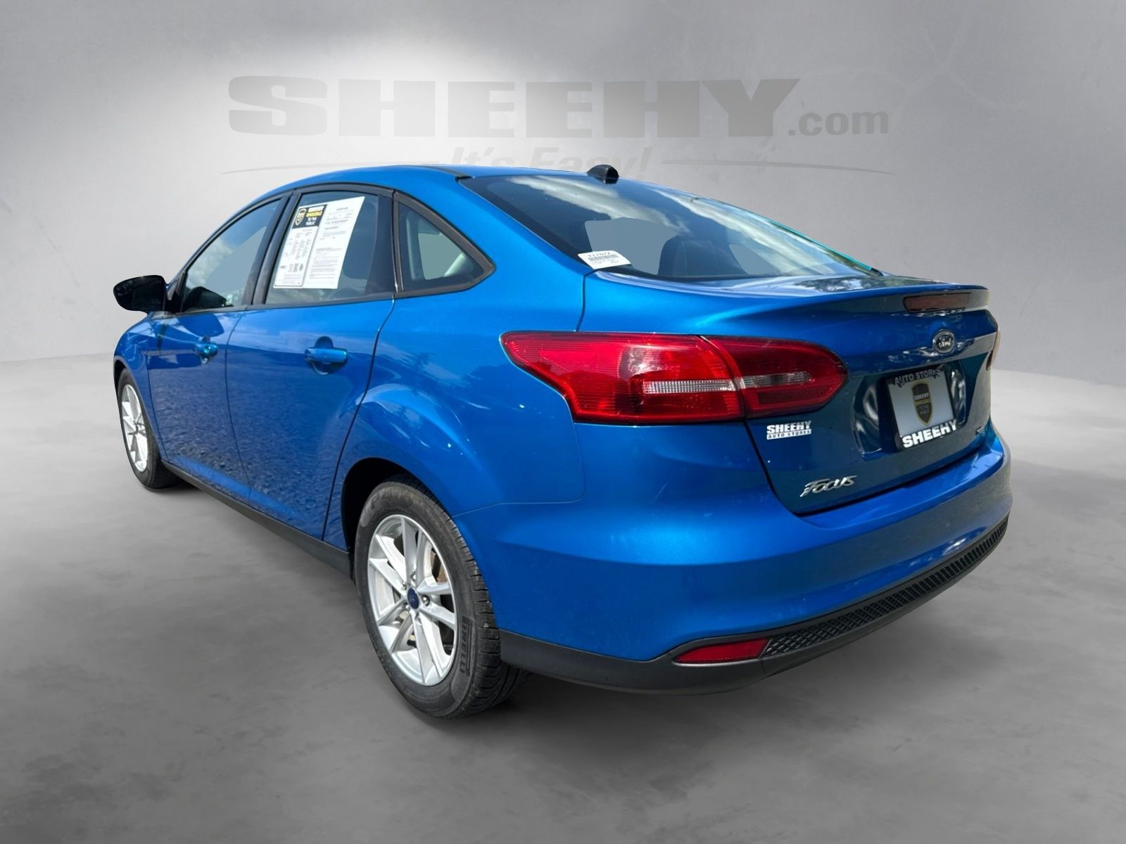 Used 2016 Blue Candy Metallic Tinted Clearcoat Ford SE image 13