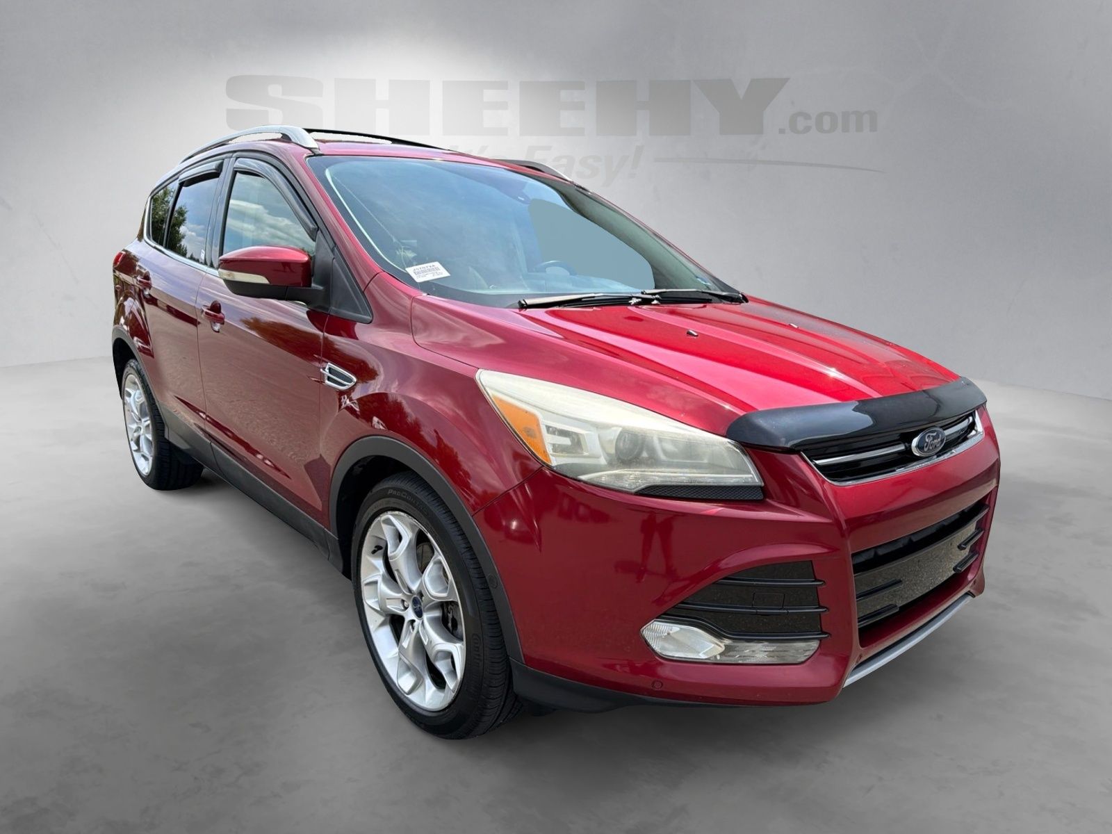 Used 2016 Ruby Red Metallic Ford Titanium image 2