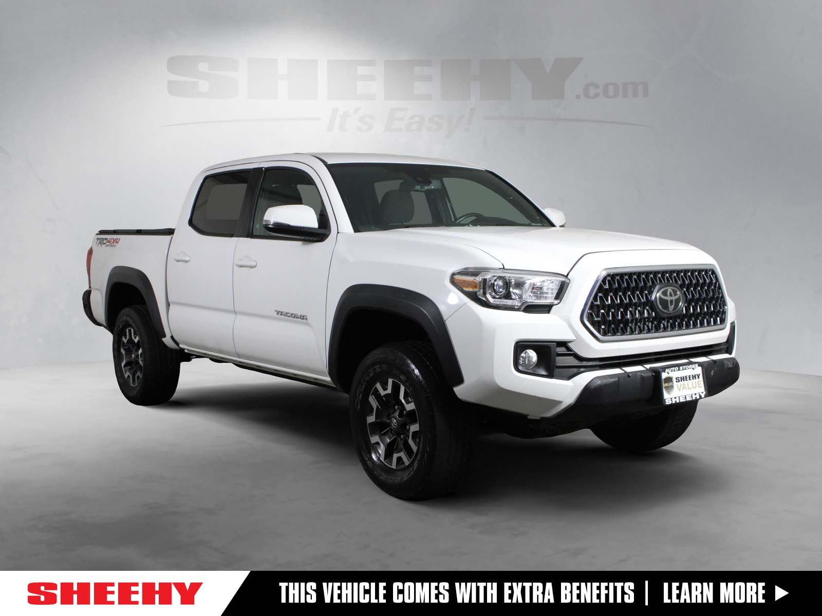 Super White 2019 Toyota Tacoma Pickup Truck Four-Wheel Drive 6-Speed Manual