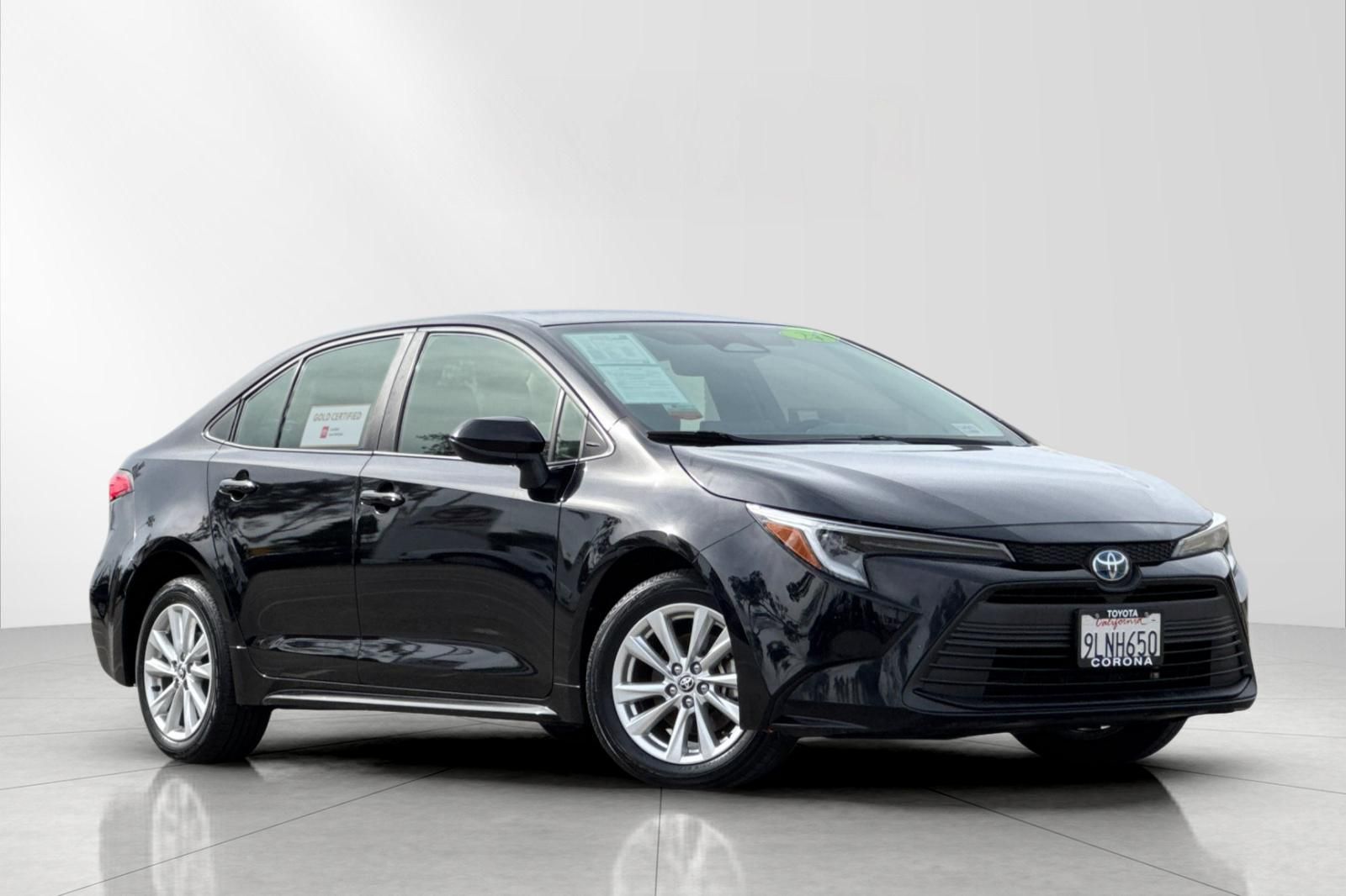 Midnight Black Metallic 2024 Toyota Corolla Hybrid LE FWD Sedan Front-Wheel Drive Continuously Variable Transmission