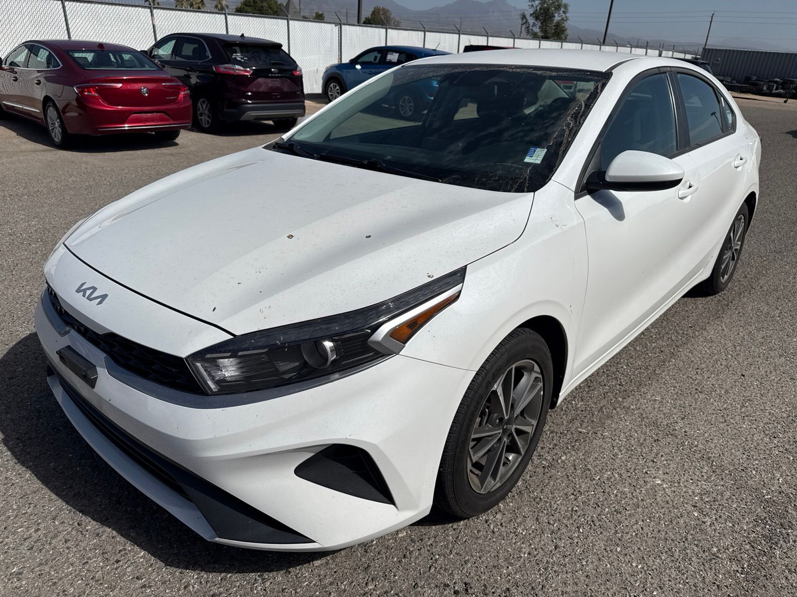 Snow White Pearl 2023 Kia Forte Sedan Front-Wheel Drive Continuously Variable Transmission