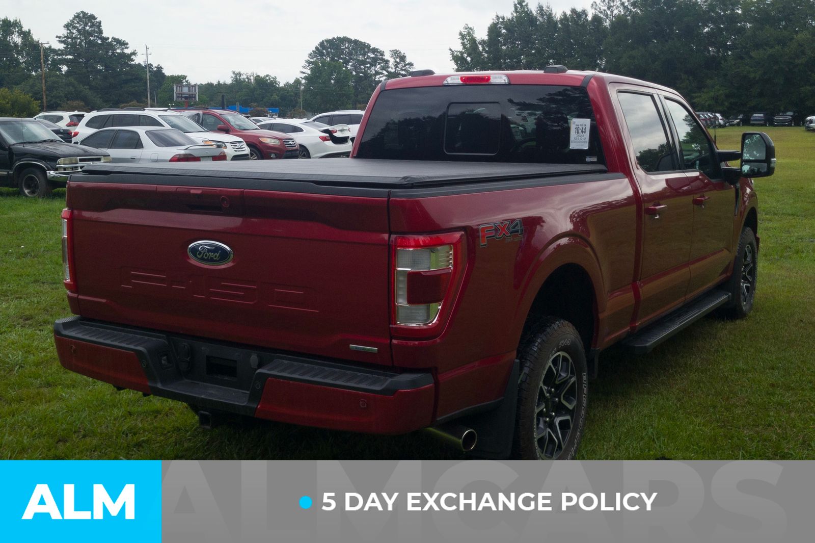 Used 2023 Rapid Red Metallic Tinted Clearcoat Ford Lariat image 4