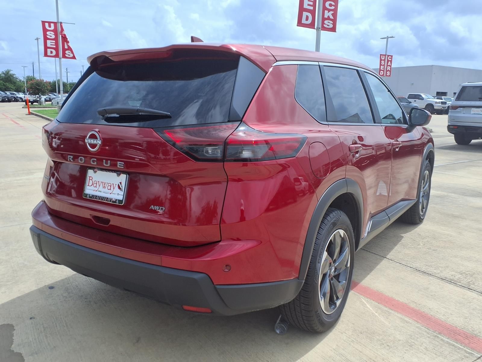 2025 Nissan Rogue SV Red at Central Houston Nissan