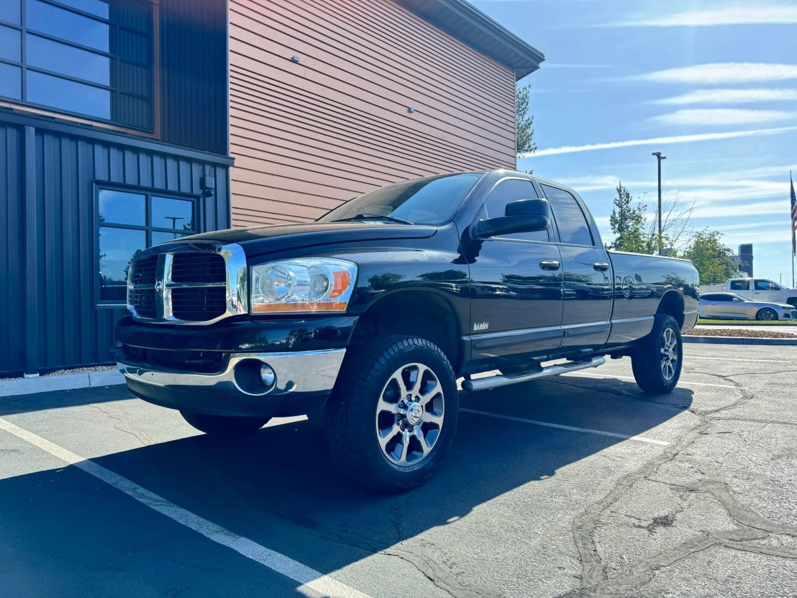 Black 2006 Dodge RAM 2500 SLT Quad Cab 4WD Pickup Truck Four-Wheel Drive 4-Speed Automatic