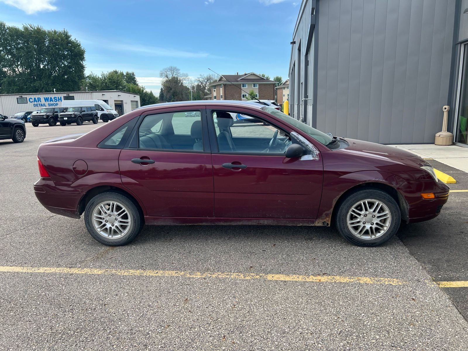 Dark Toreador Red Clearcoat Metallic 2007 Ford Focus Sedan Front-Wheel Drive 4-Speed Automatic