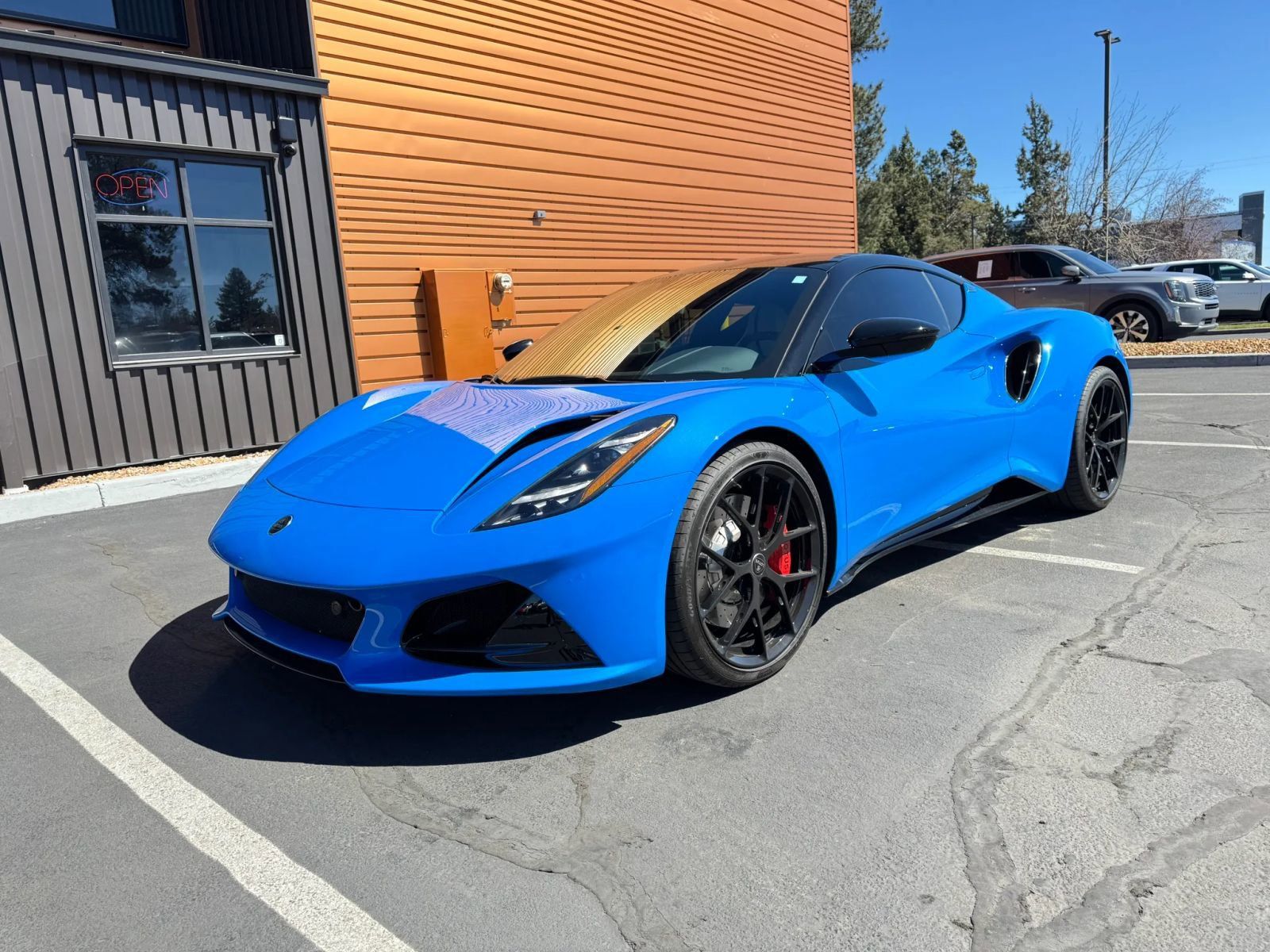 Blue 2024 Lotus Emira V6 First Edition RWD Coupe Rear-Wheel Drive 6-Speed Manual
