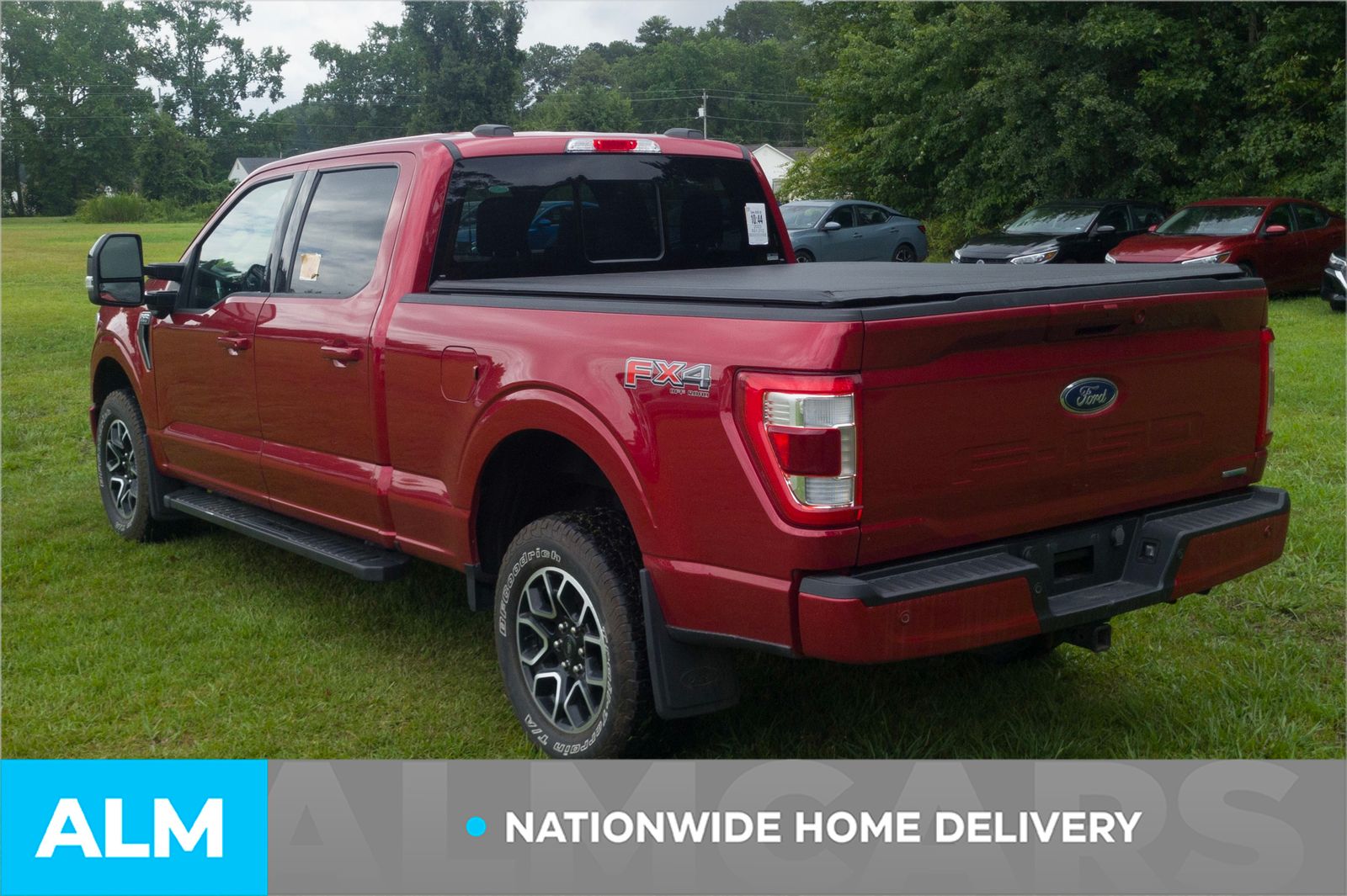 Used 2023 Rapid Red Metallic Tinted Clearcoat Ford Lariat image 5