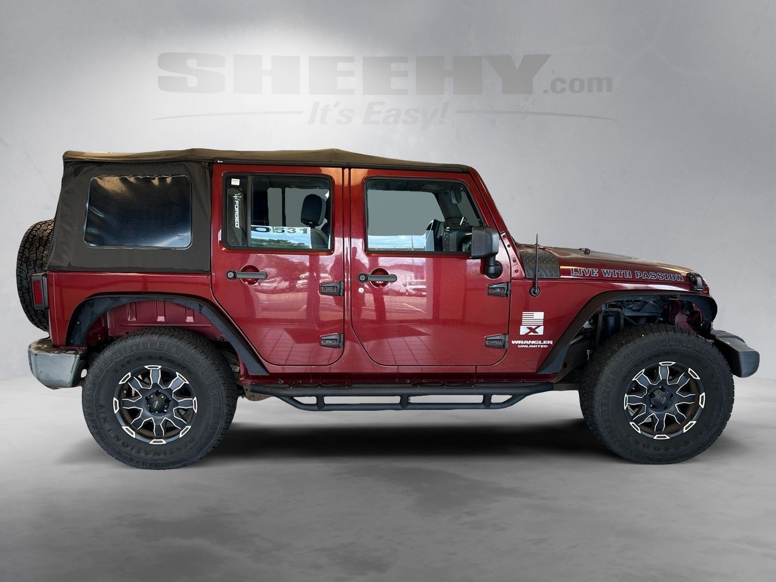 Used 2007 Red Rock Crystal Pearlcoat Jeep Unlimited X image 9