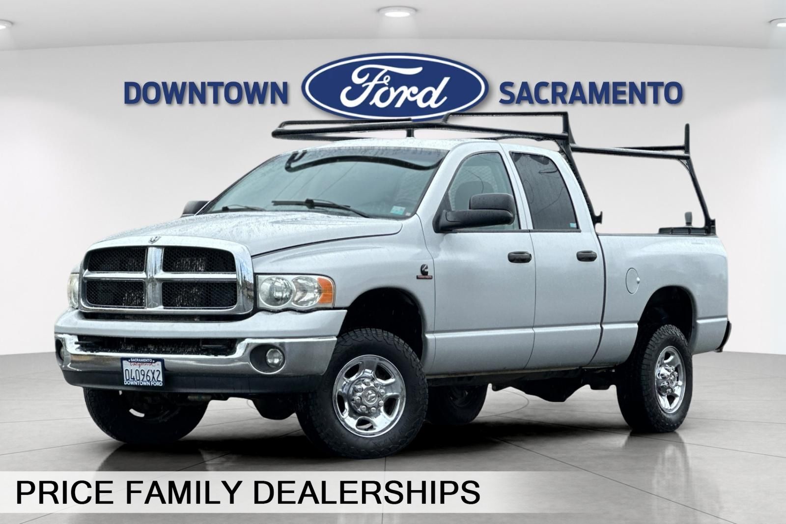 Bright Silver Metallic 2004 Dodge RAM 2500 SLT Quad Cab 4WD Pickup Truck Four-Wheel Drive 4-Speed Automatic