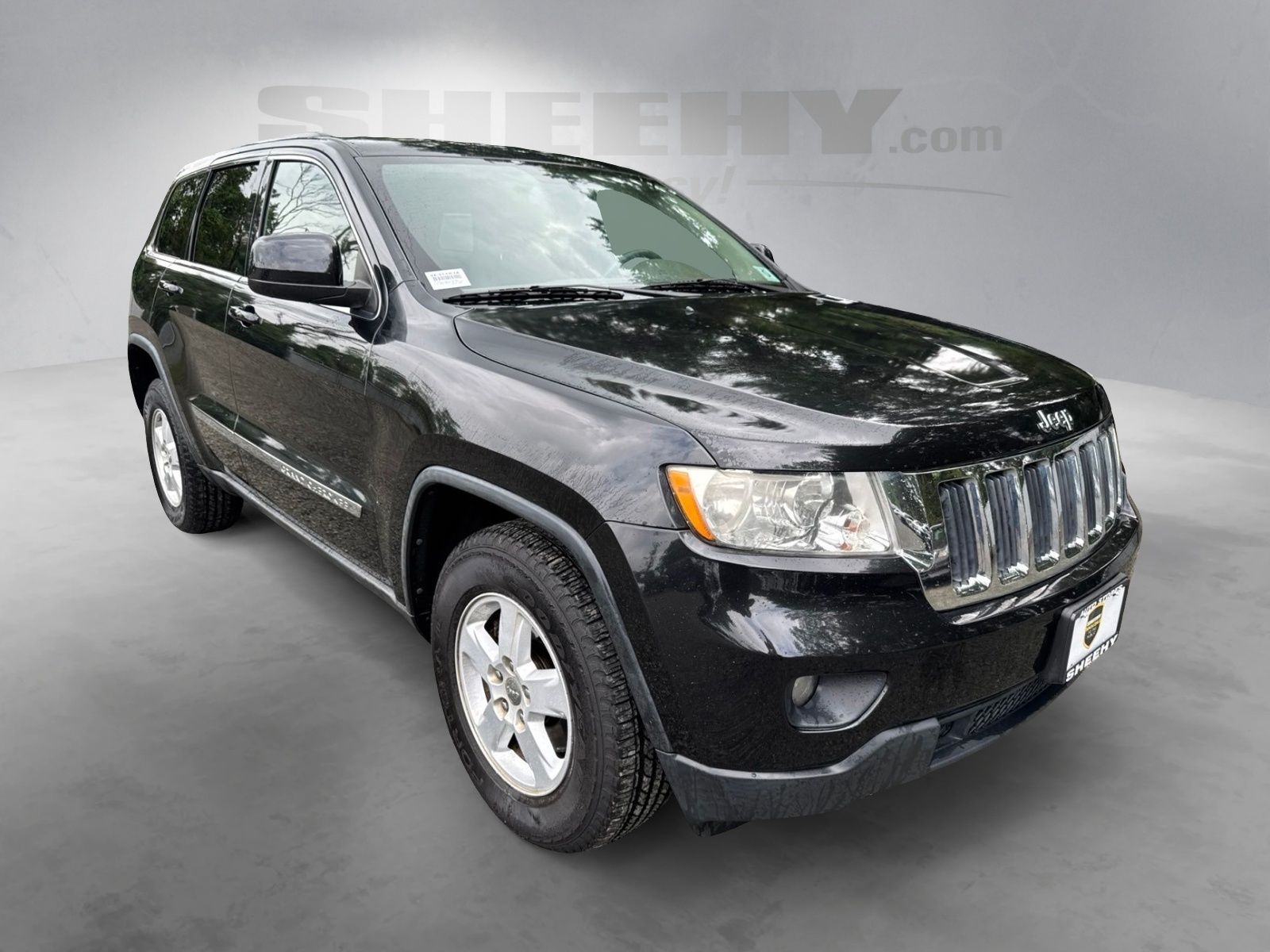 Used 2012 Brilliant Black Crystal Pearlcoat Jeep Laredo image 2
