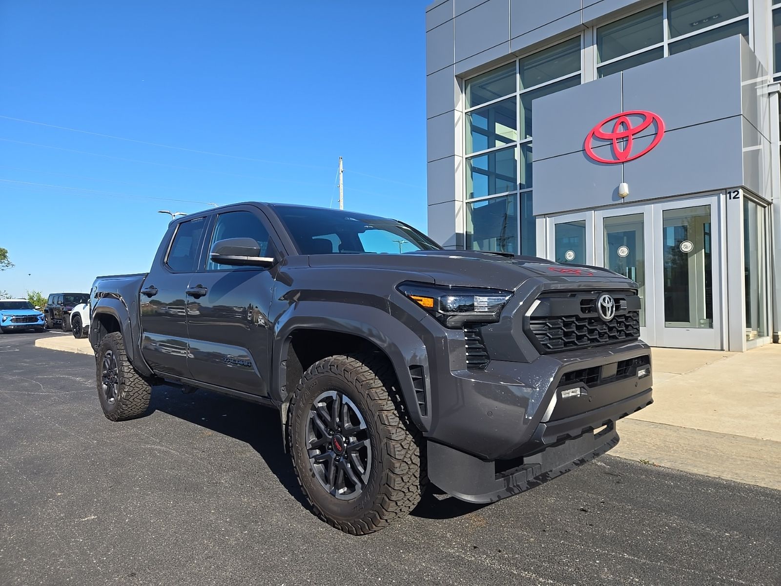 used 2024 Toyota Tacoma car, priced at $38,676