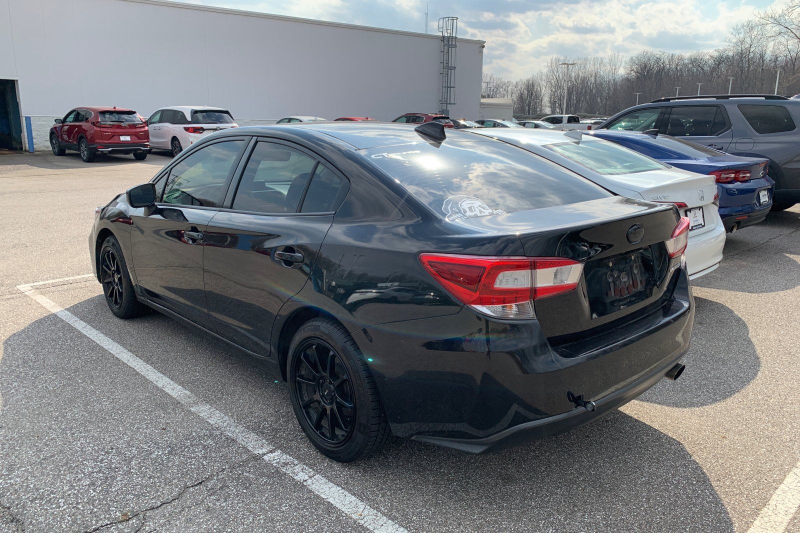 View vehicle photo 3