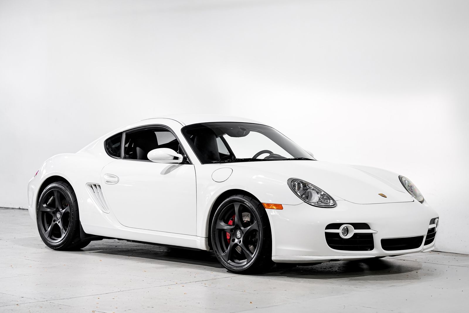 Carrera White 2006 Porsche Cayman Coupe Rear-Wheel Drive 6-Speed Manual Overdrive