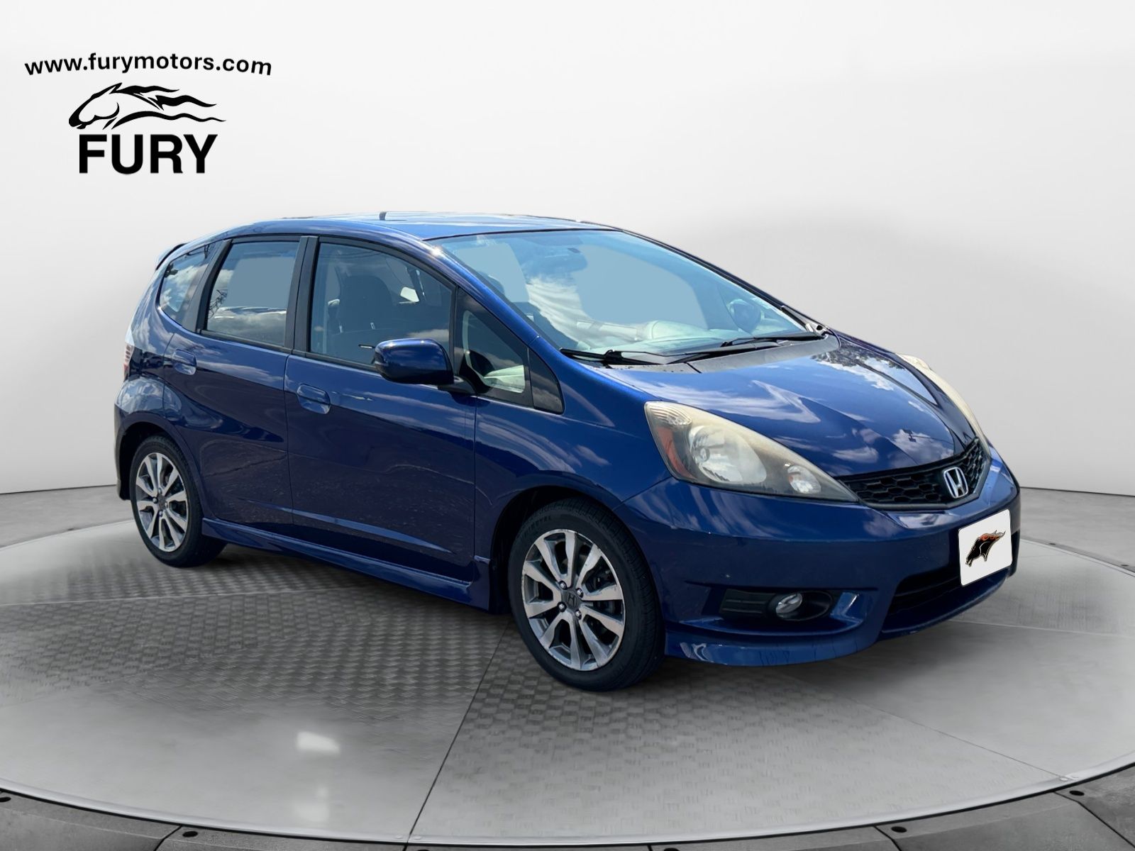 Blue 2012 Honda Fit Hatchback Front-Wheel Drive 5-Speed Automatic