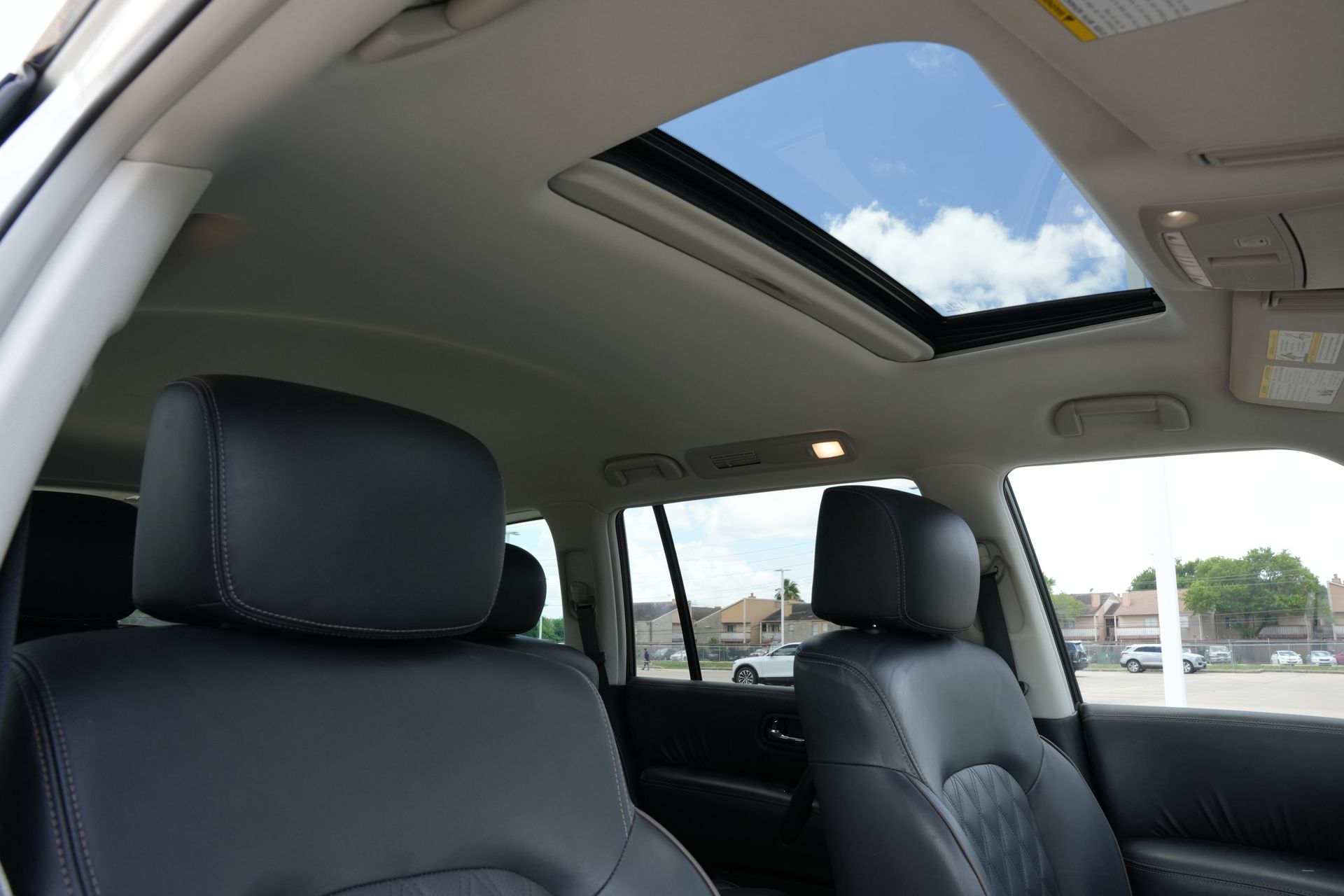 2023 Nissan Armada Platinum White at DeMontrond Ford