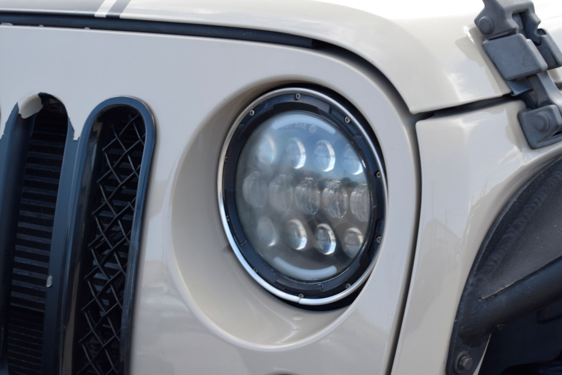 2016 Jeep Wrangler Unlimited Sport Beige at DeMontrond Automotive Group