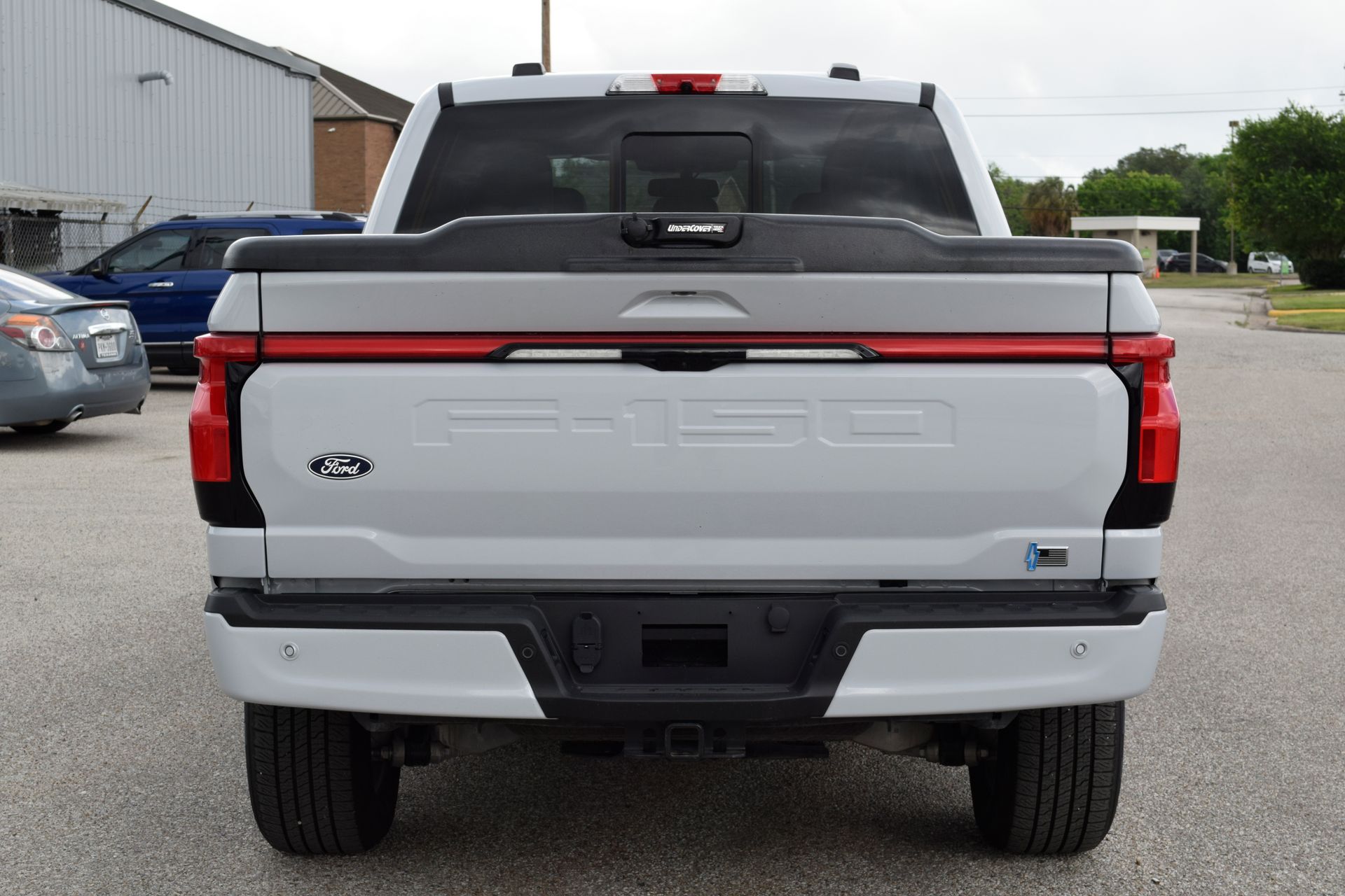 2025 Ford F-150 Lightning Lariat White at DeMontrond Ford