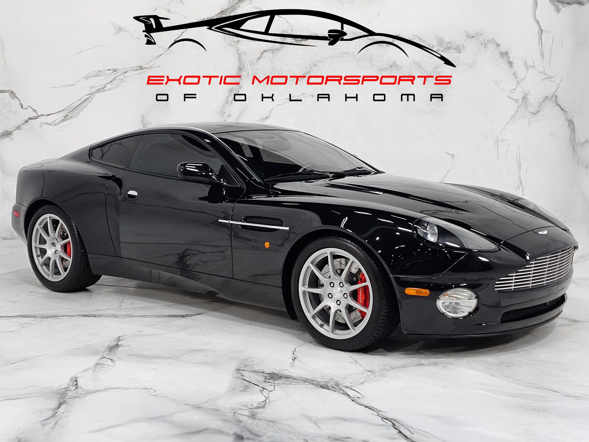 Black 2004 Aston Martin V12 Vanquish RWD Coupe Rear-Wheel Drive 6-Speed Automatic