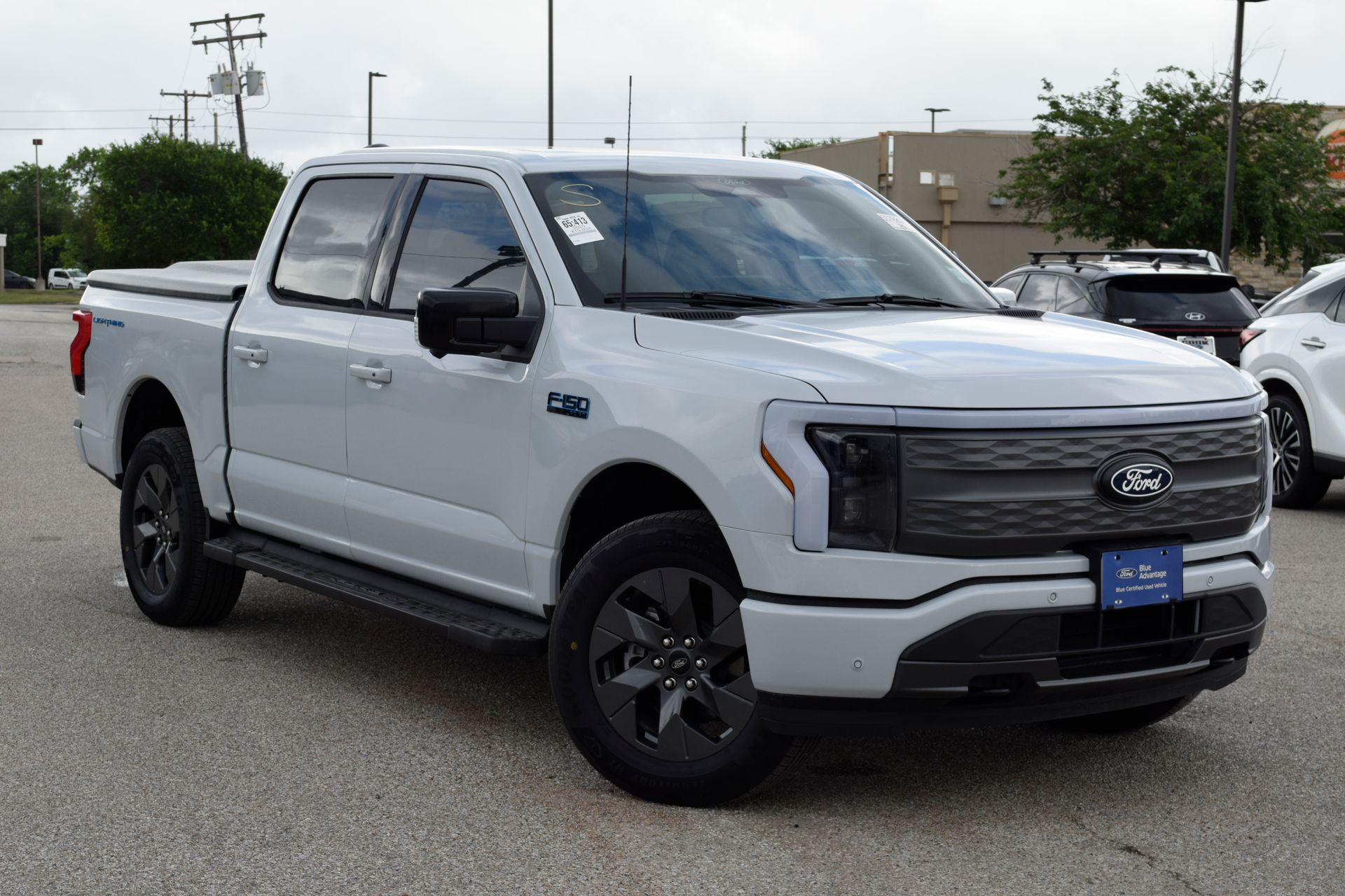 2025 Ford F-150 Lightning Lariat White at DeMontrond Ford