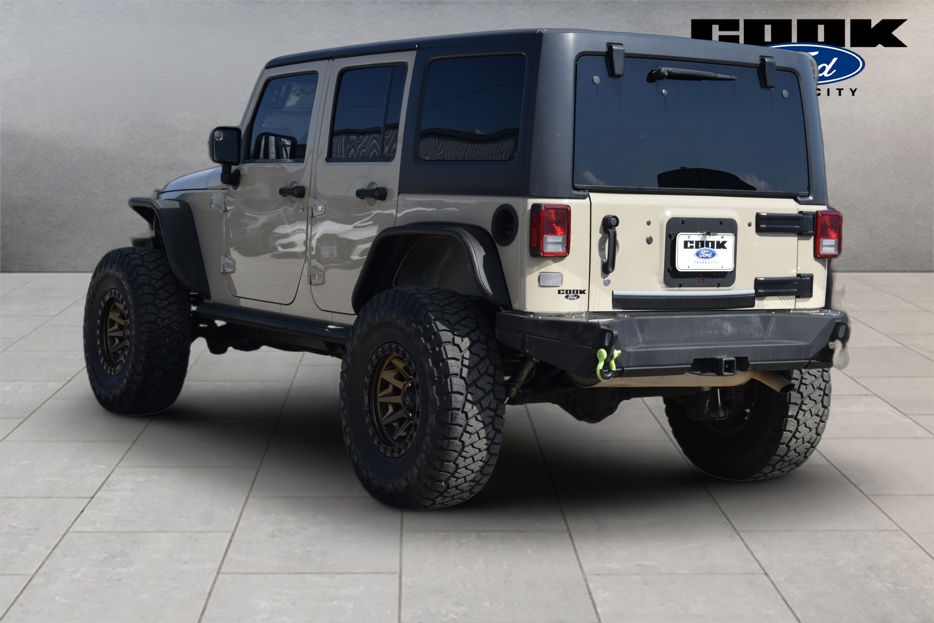 2016 Jeep Wrangler Unlimited Sport Beige at DeMontrond Automotive Group