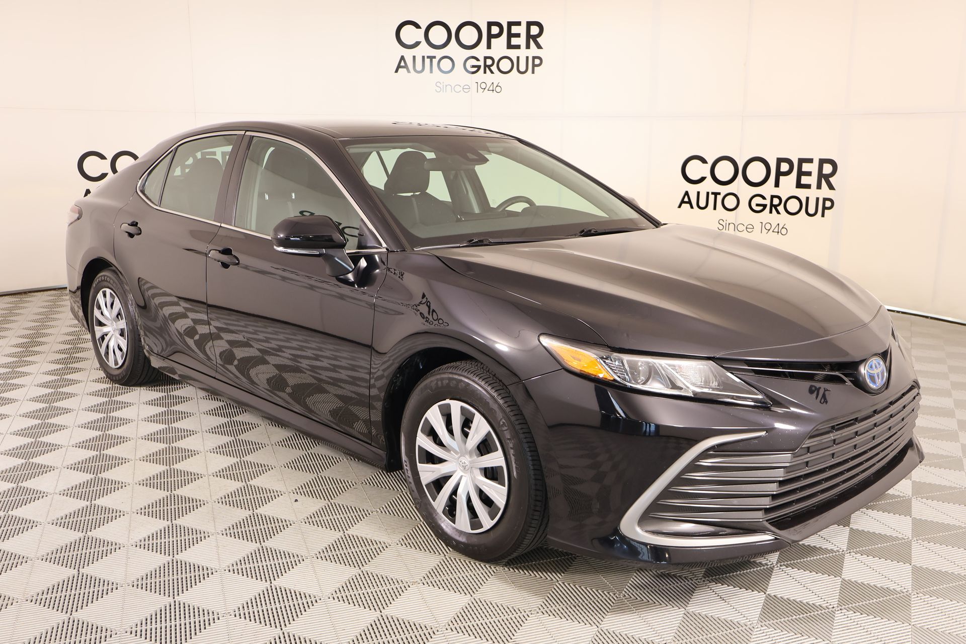 Midnight Black Metallic 2024 Toyota Camry Hybrid Sedan Front-Wheel Drive Continuously Variable Transmission